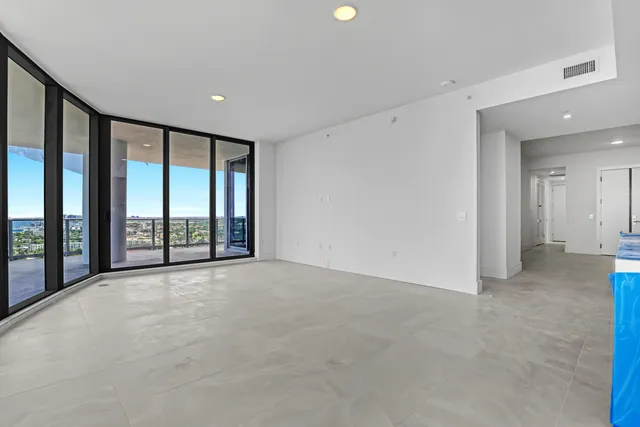an aerial view of a swimming pool and outdoor space