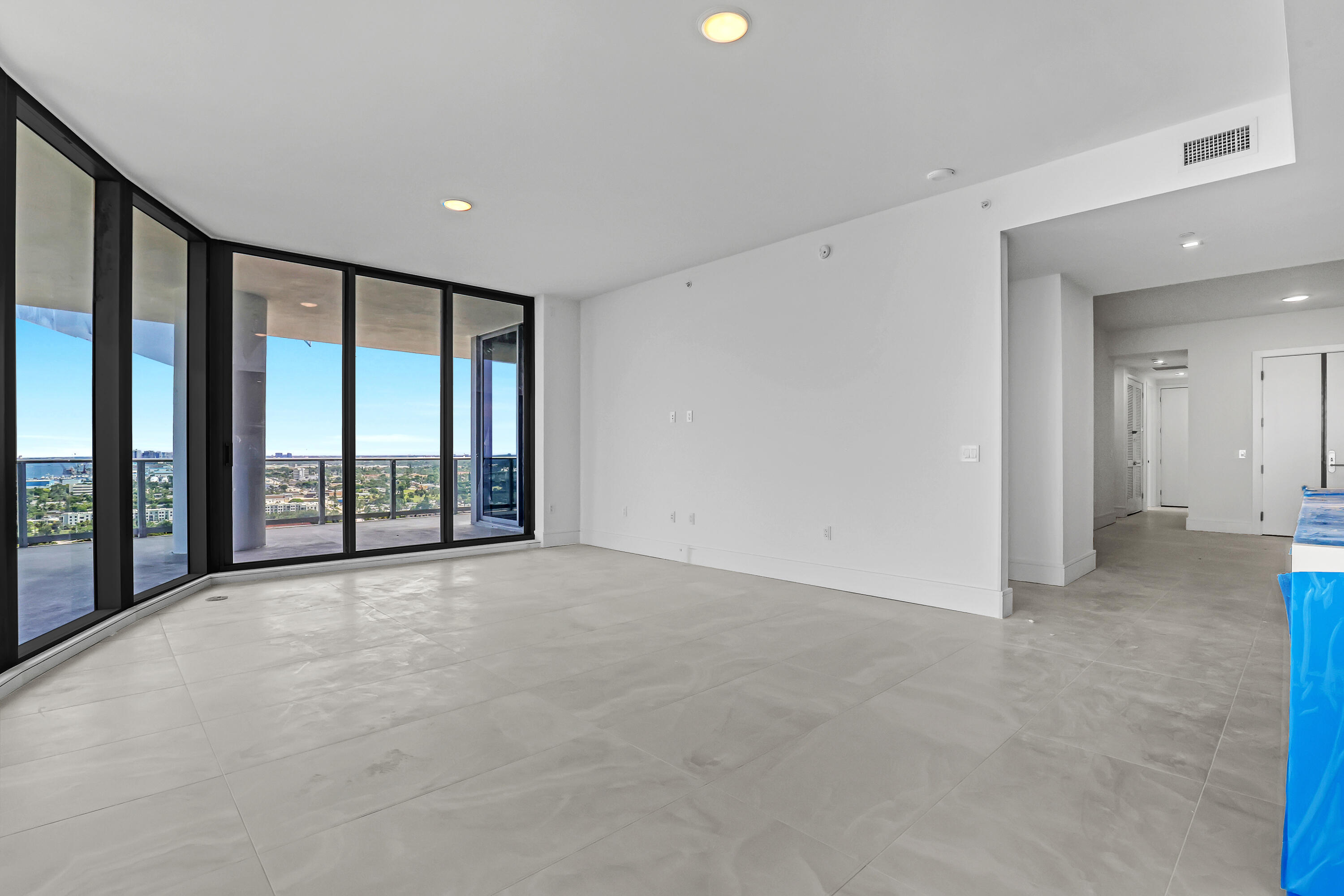 220 Lake Shore Drive, Unit N2103 Lake Park, FL 33403 - Photo 20 of 57 wooden floor in an empty room with a large window