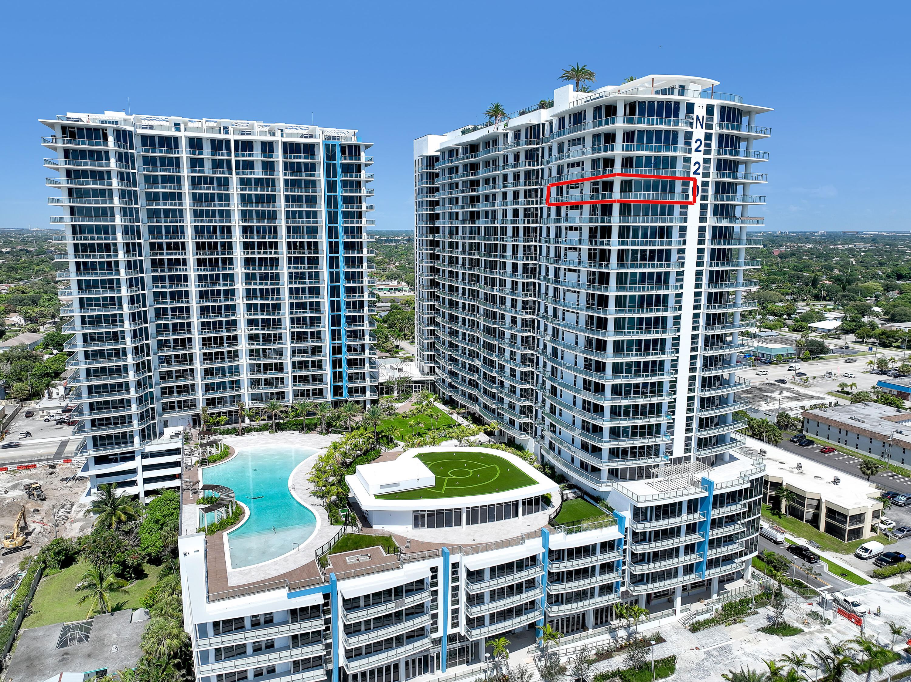 220 Lake Shore Drive, Unit N2103 Lake Park, FL 33403 - Photo 2 of 57 a view of a balcony with a table and chairs