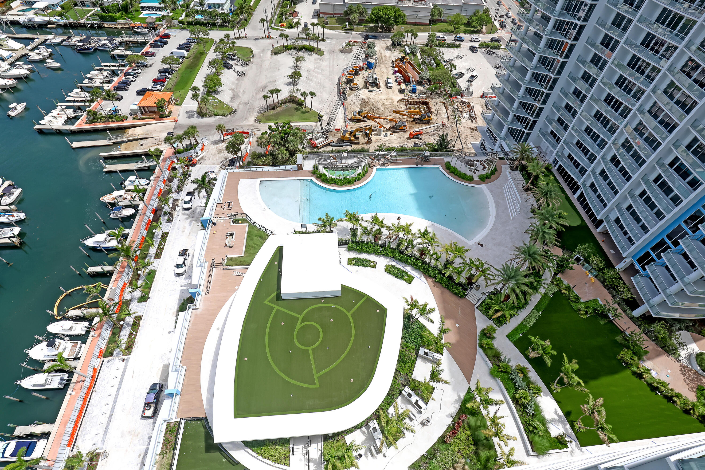 220 Lake Shore Drive, Unit N2103 Lake Park, FL 33403 - Photo 29 of 57 an aerial view of a swimming pool and outdoor space