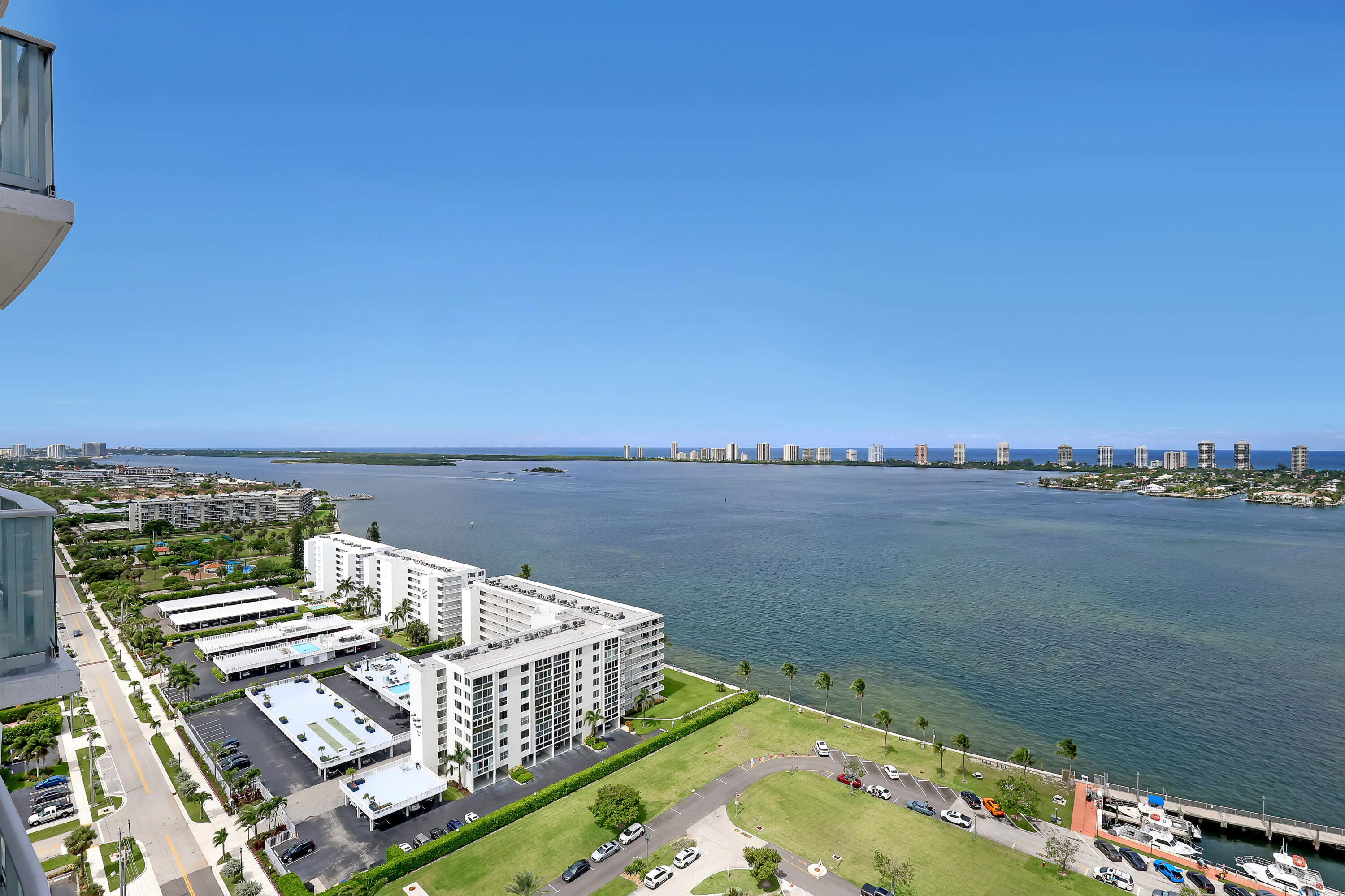220 Lake Shore Drive, Unit N2103 Lake Park, FL 33403 - Photo 37 of 57 a view of a balcony with lake view