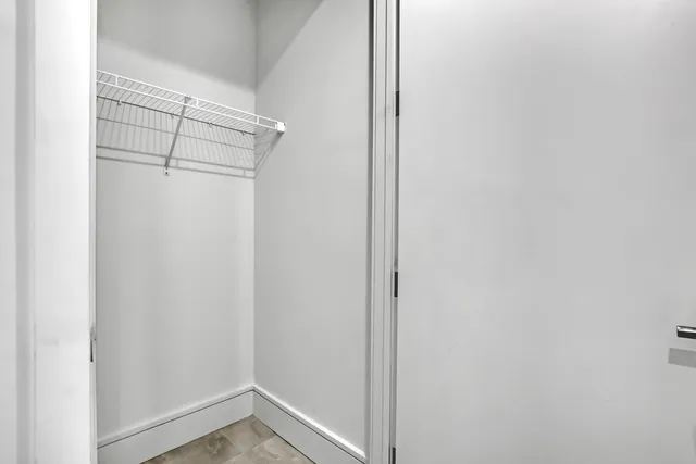 a bathroom with a sink mirror and a bathtub