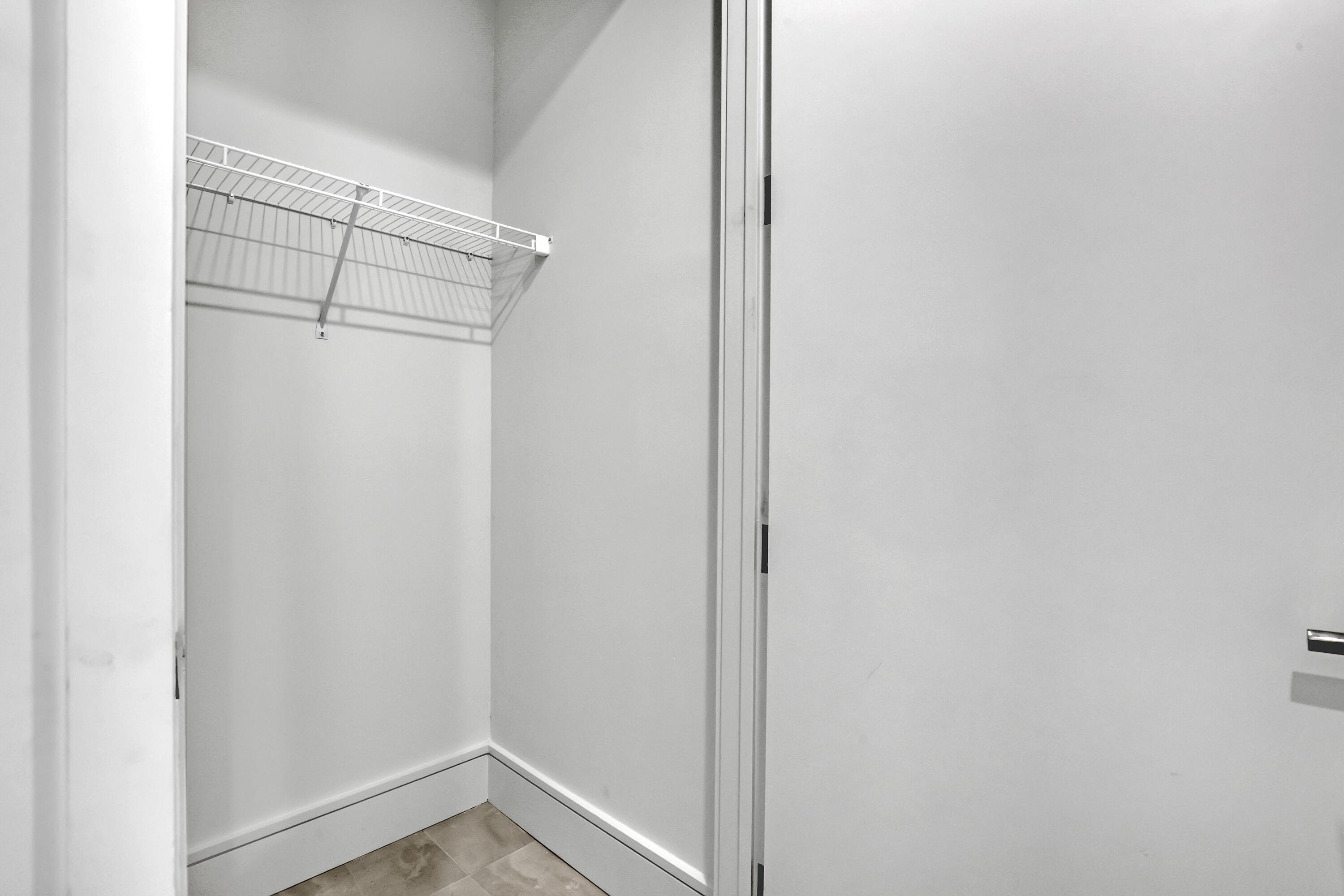 220 Lake Shore Drive, Unit N2103 Lake Park, FL 33403 - Photo 40 of 57 a view of a room with shelf