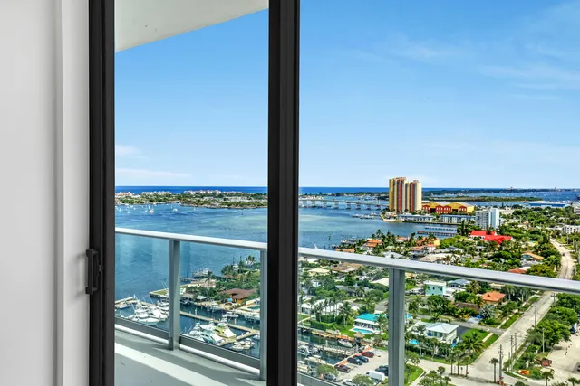 a bathroom with a white toilet and a sink