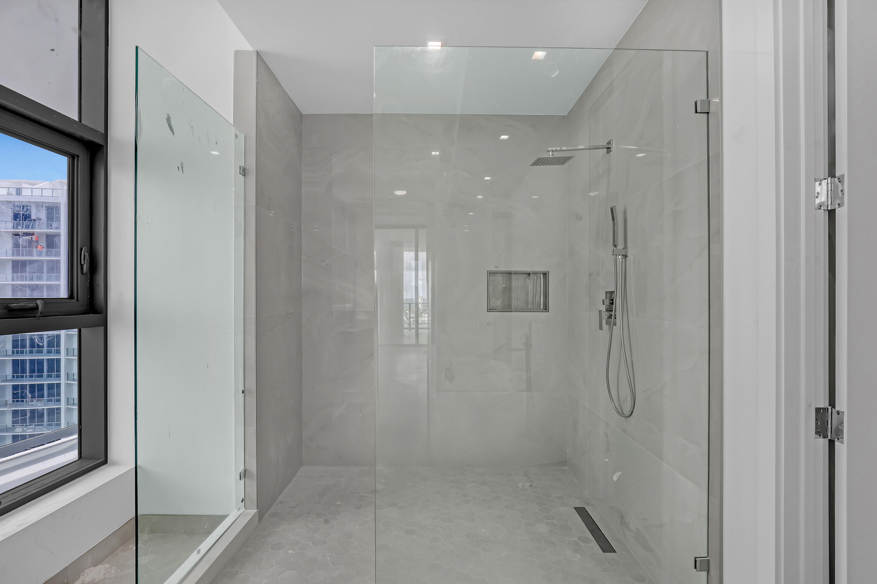 220 Lake Shore Drive, Unit N2103 Lake Park, FL 33403 - Photo 55 of 57 a bathroom with a shower