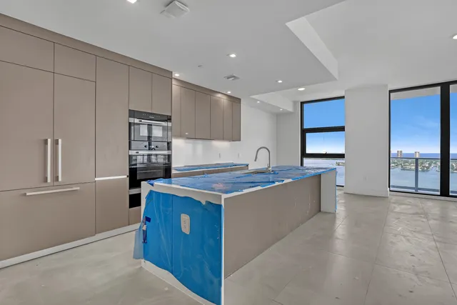 an aerial view of a house with a garden