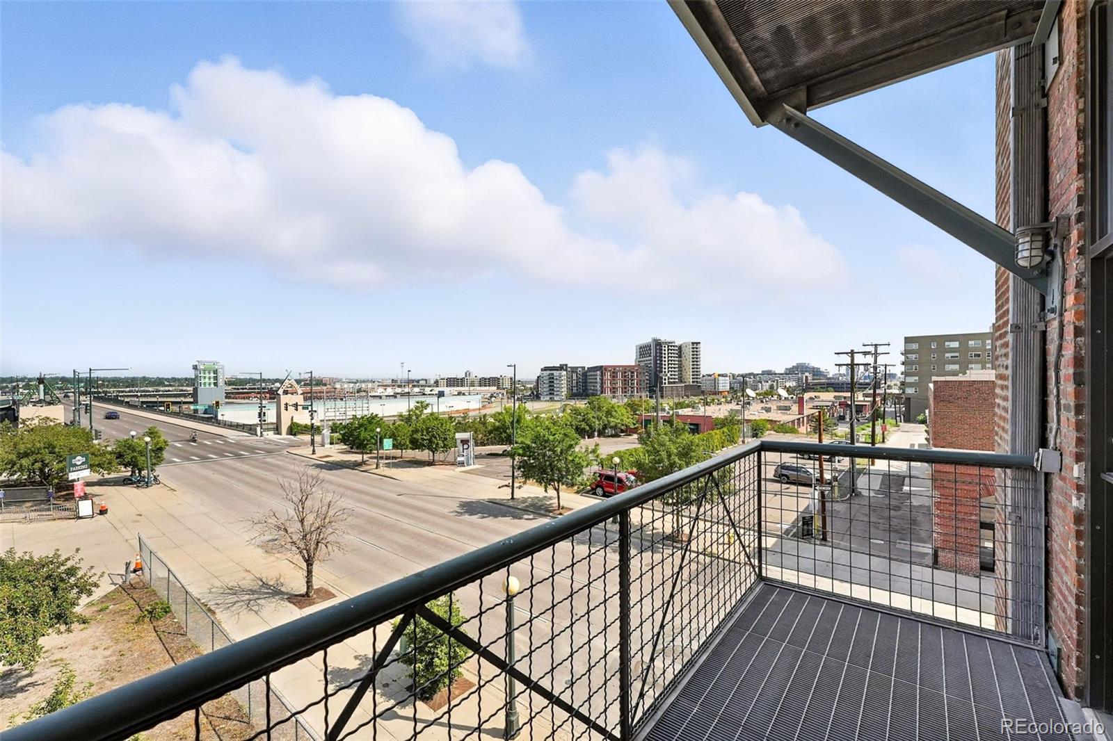 2261 Blake Street, Unit 3E Denver, CO 80205 - Photo 20 of 46 a view of balcony with furniture
