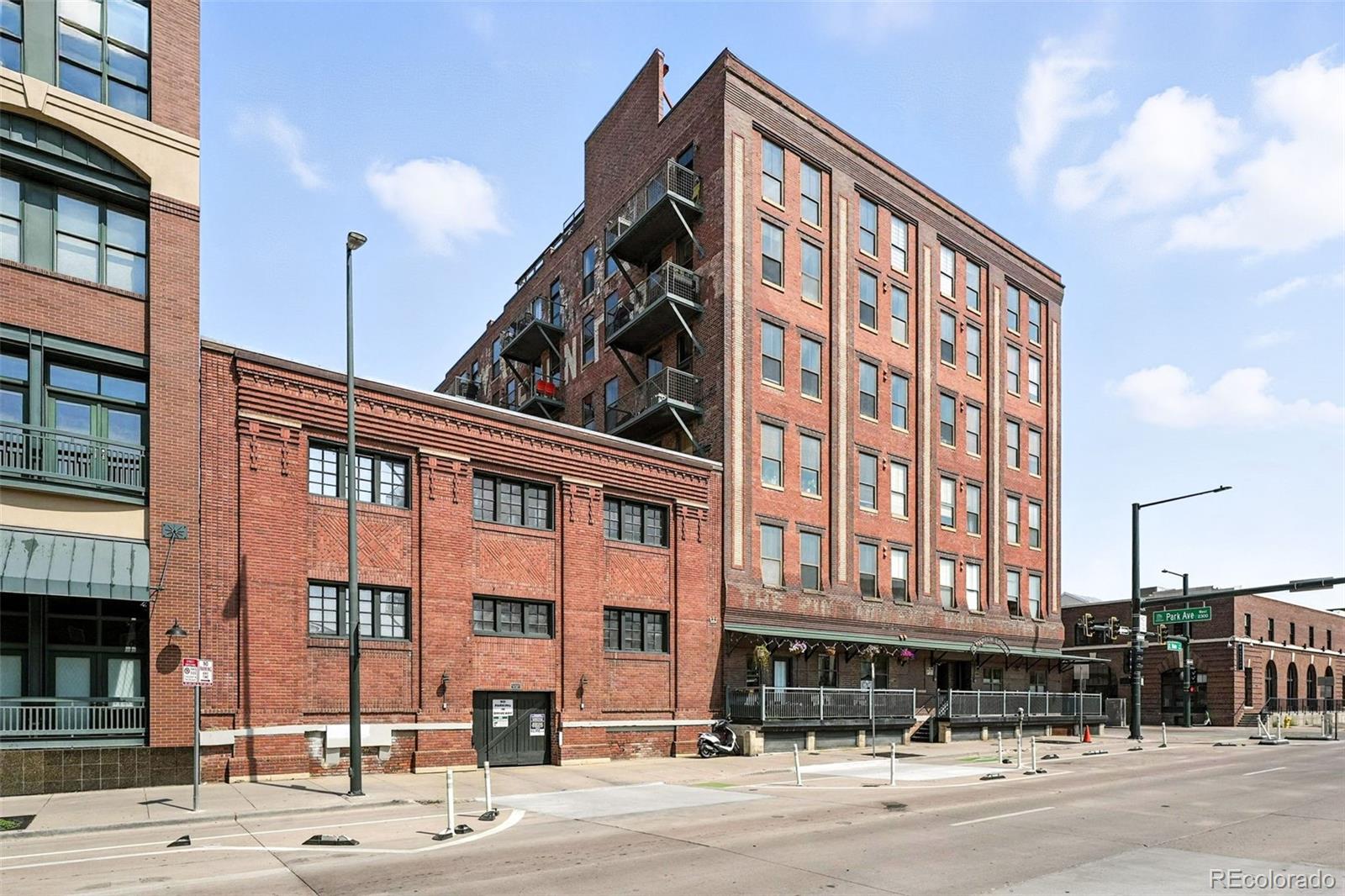 2261 Blake Street, Unit 3E Denver, CO 80205 - Photo 39 of 46 a front view of a building and a street