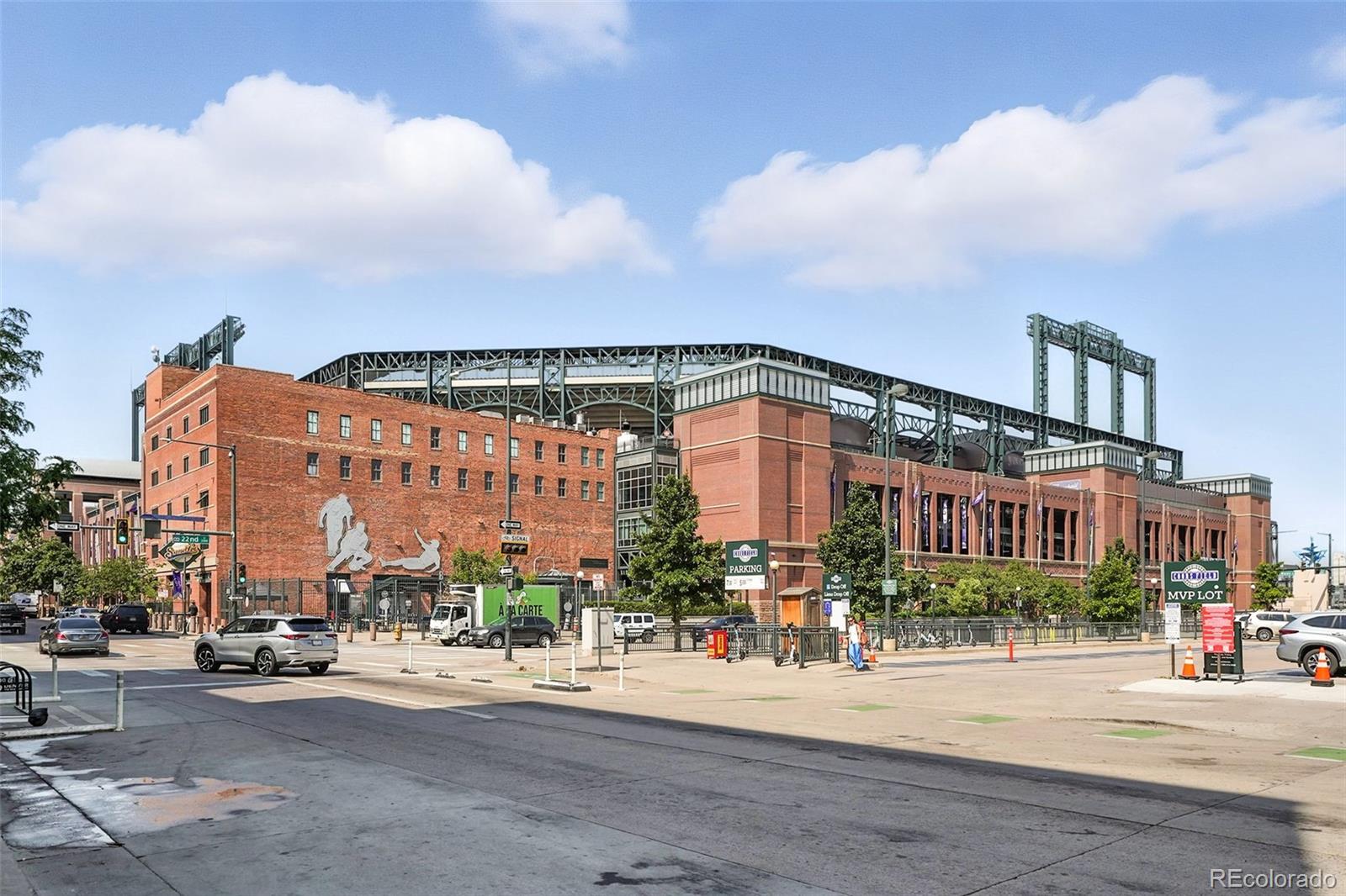 2261 Blake Street, Unit 3E Denver, CO 80205 - Photo 41 of 46 a city street lined with buildings and a street light