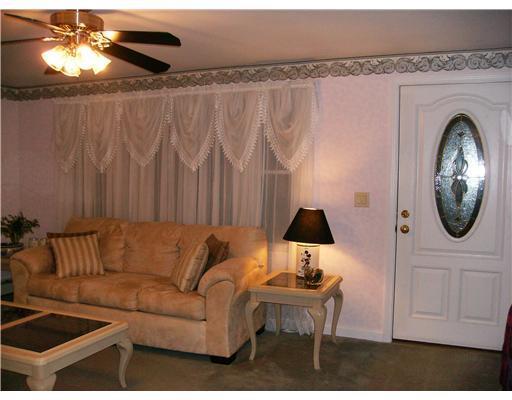 118 Garvin Road, Unit ROAD Acton, ME 04001 - Photo 4 of 19 Living Room. Over nine feet of glass...