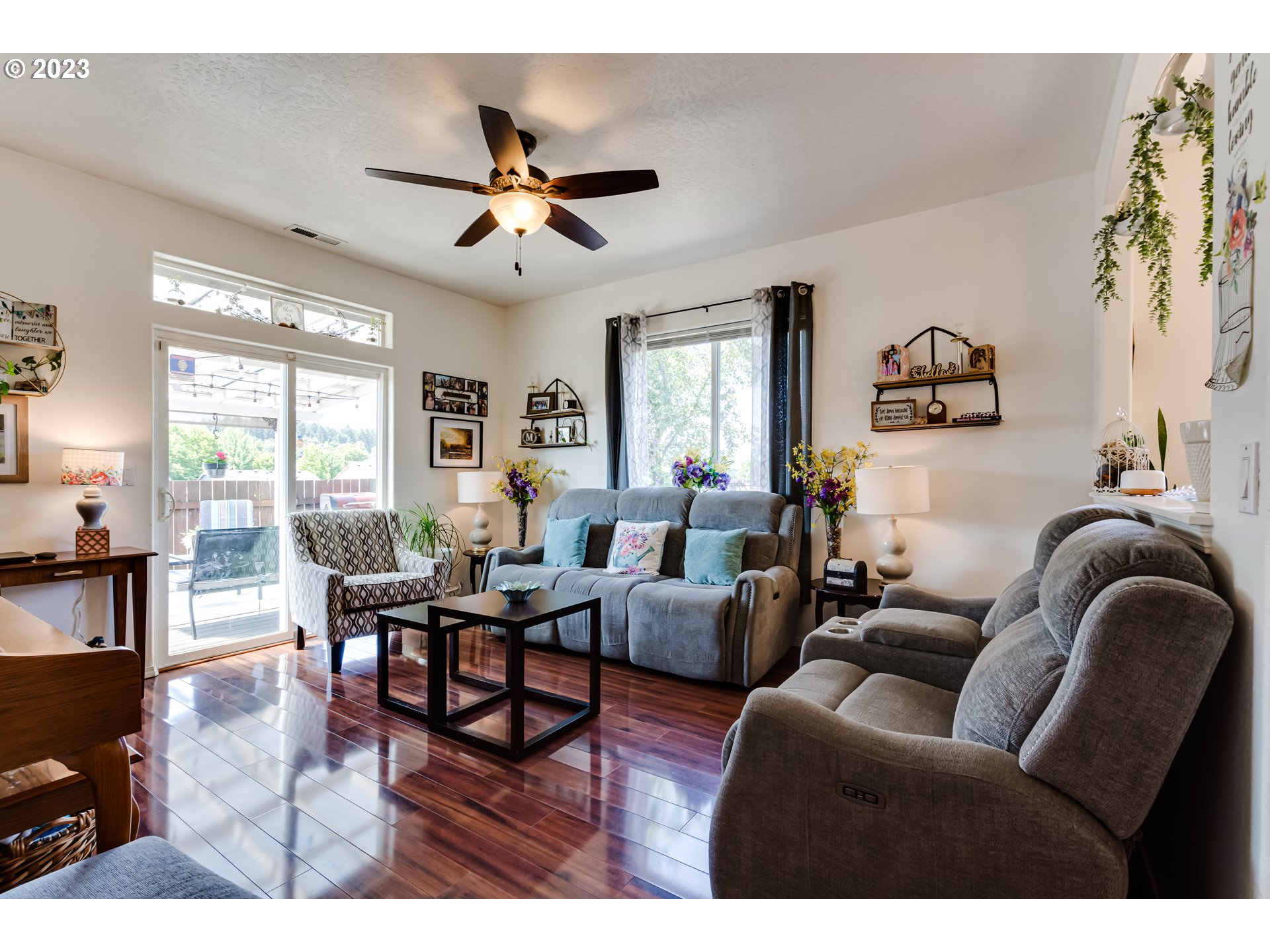 1616 South 59th Street Springfield, OR 97478 - Photo 18 of 44 a living room with furniture and a large window