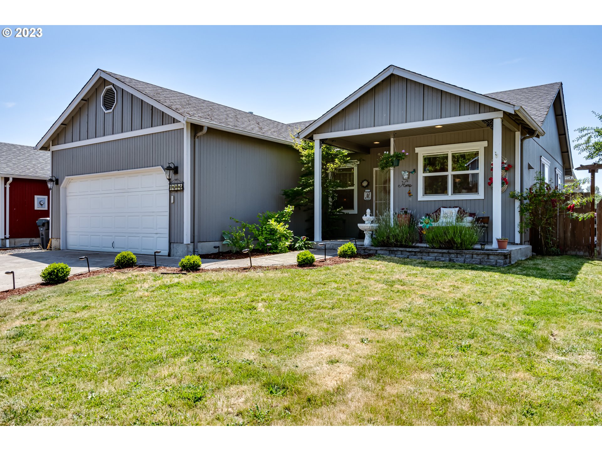 1616 South 59th Street Springfield, OR 97478 - Photo 3 of 44 a front view of a house with garden