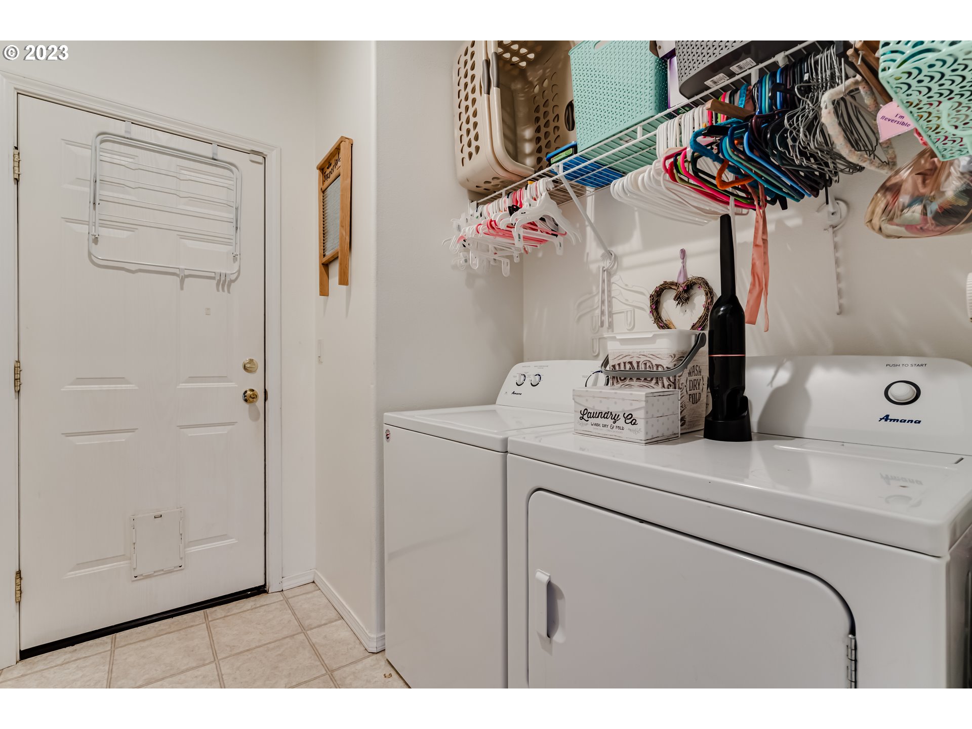 1616 South 59th Street Springfield, OR 97478 - Photo 34 of 44 a utility room with dryer and washer