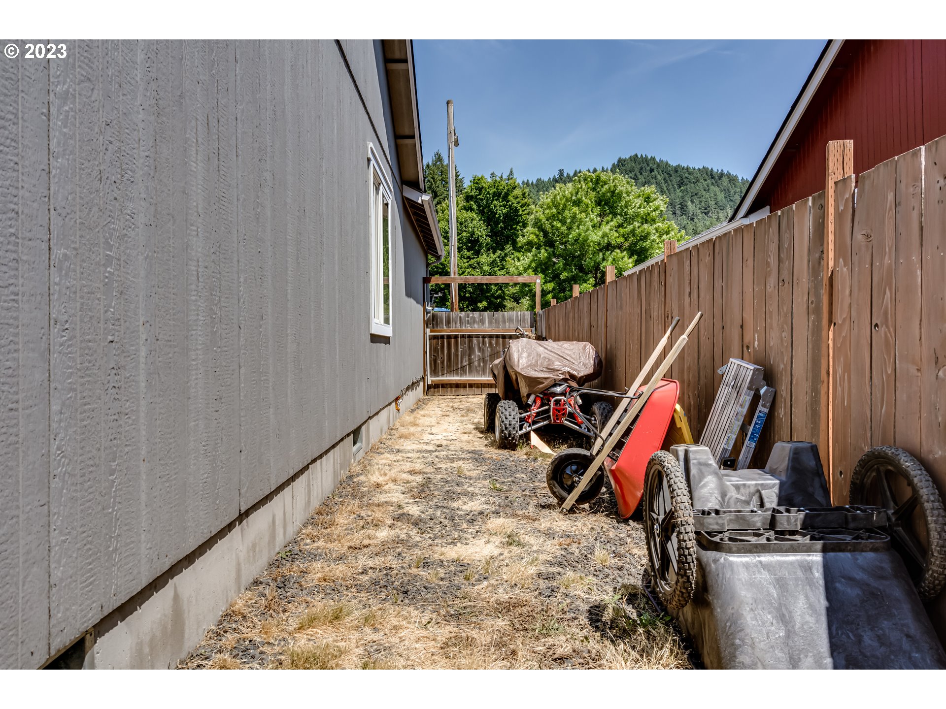 1616 South 59th Street Springfield, OR 97478 - Photo 44 of 44 a view of a backyard with a patio