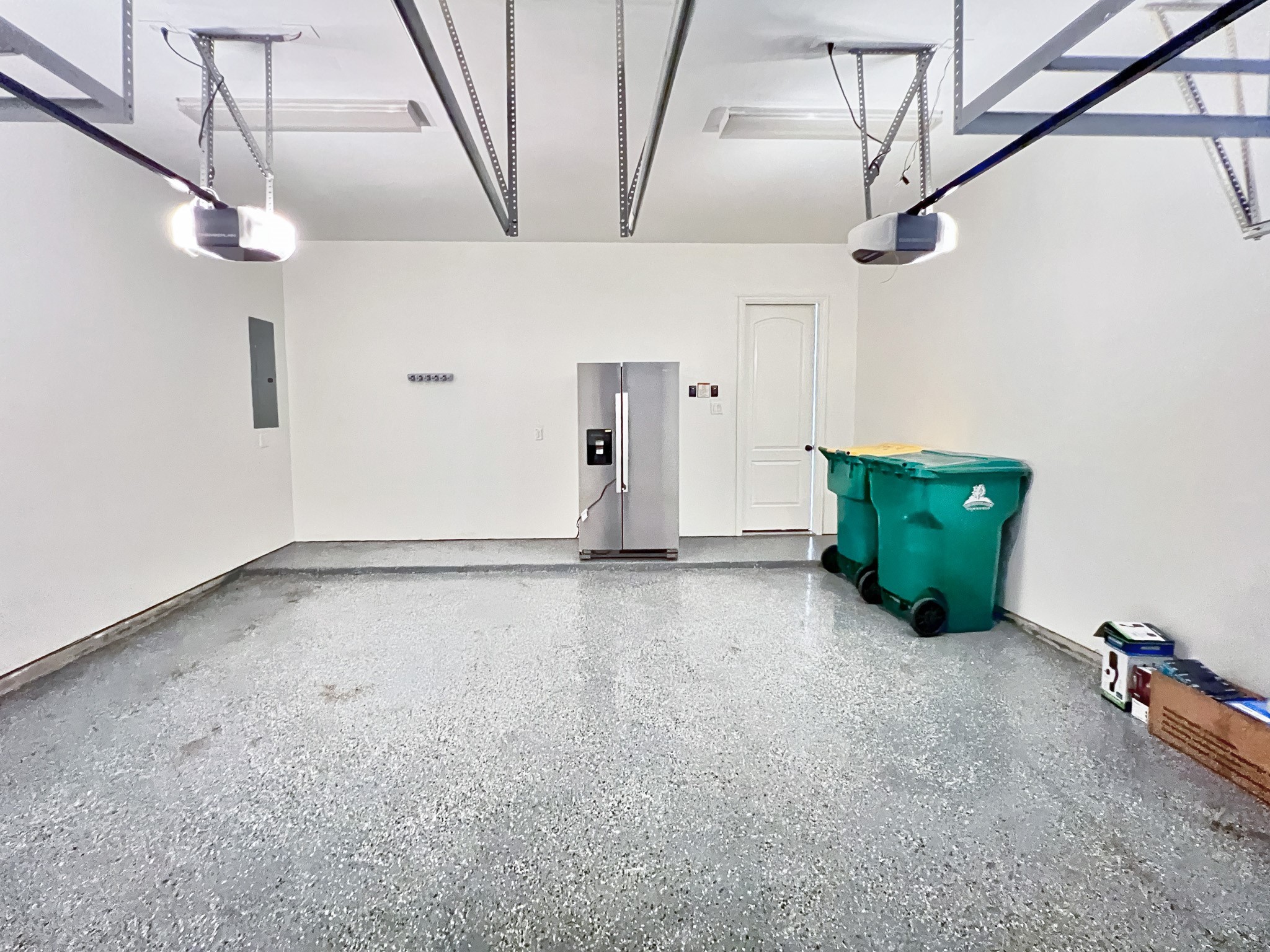 78 Lindenberry Circle Tomball, TX 77375 - Photo 35 of 36 Spacious 2-car garage with Epoxy Floors