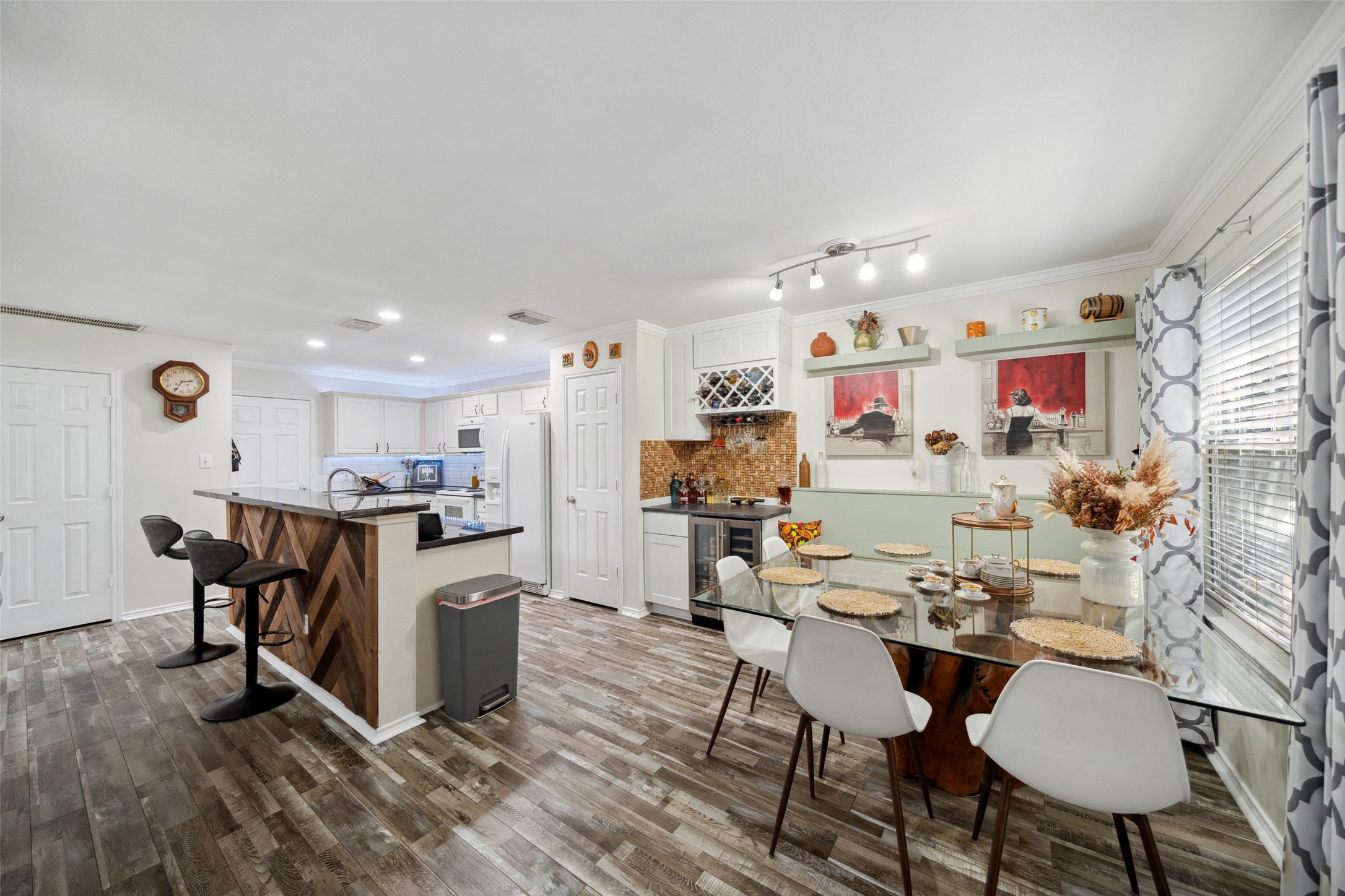 38 Wineberry Place Spring, TX 77382 - Photo 1 of 32 a view of kitchen with cabinets and wooden floor