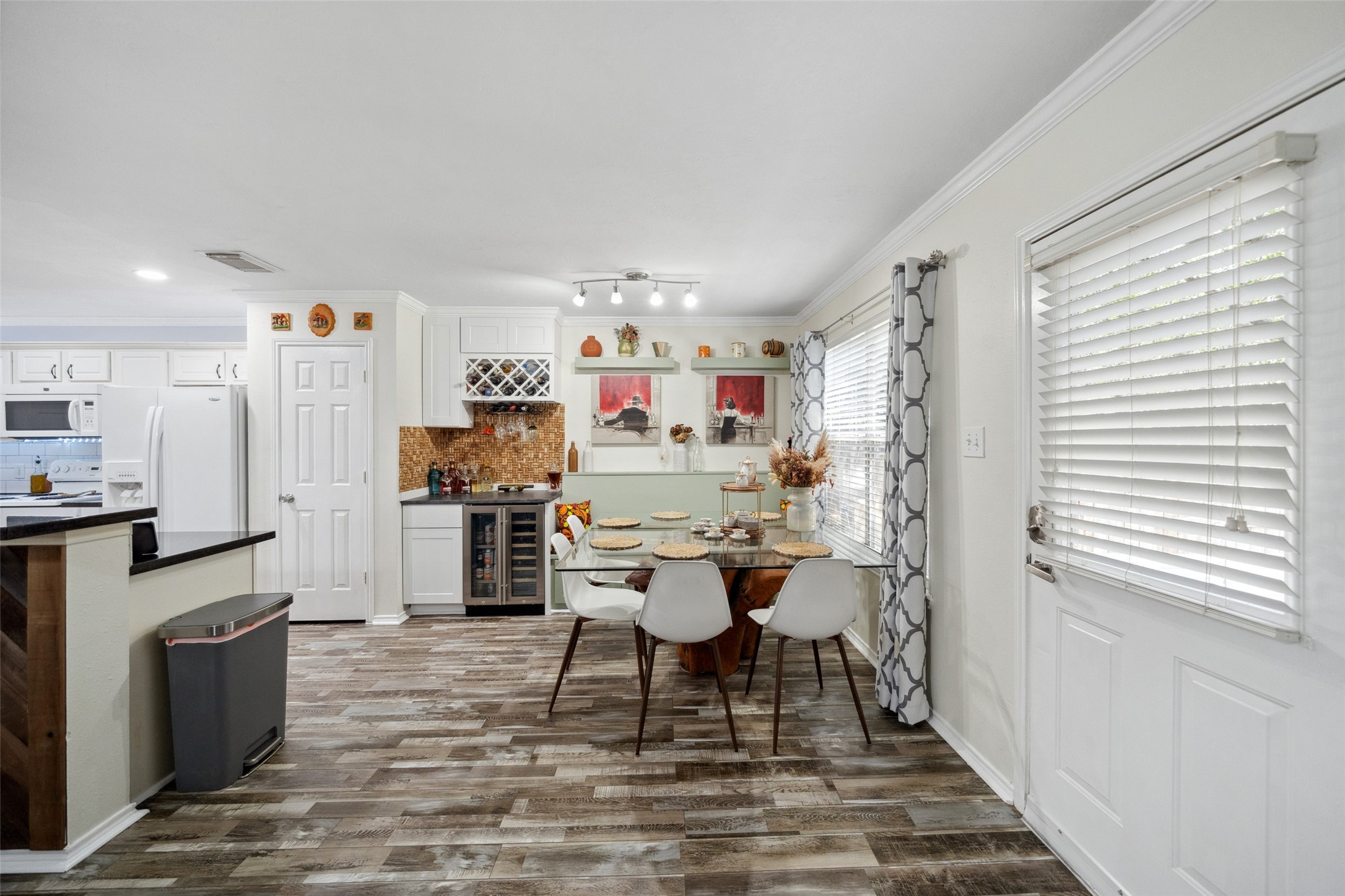 38 Wineberry Place Spring, TX 77382 - Photo 12 of 32 a dining room with furniture and kitchen view