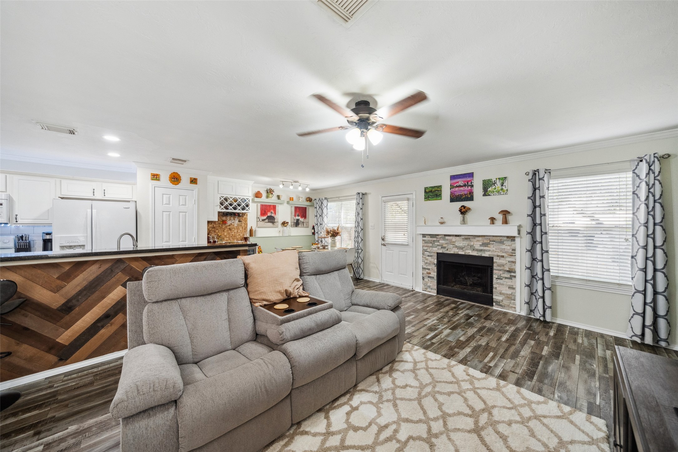 38 Wineberry Place Spring, TX 77382 - Photo 16 of 32 a living room with furniture and a fireplace