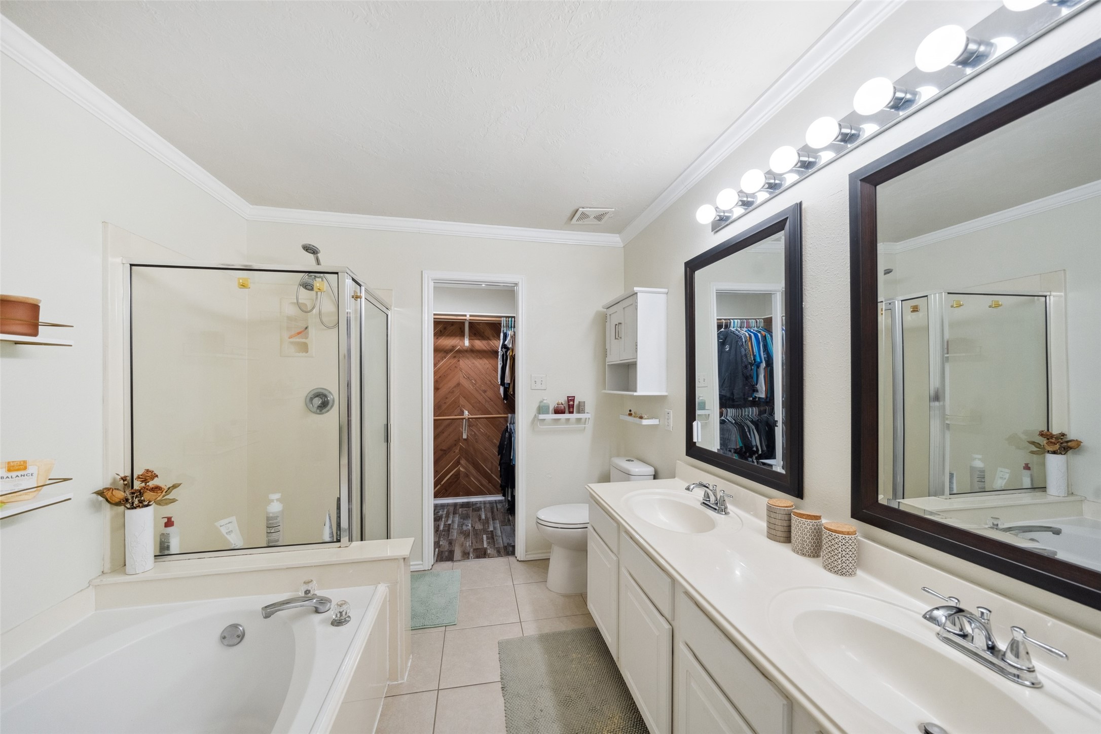 38 Wineberry Place Spring, TX 77382 - Photo 22 of 32 a bathroom with a double vanity sink mirror and shower