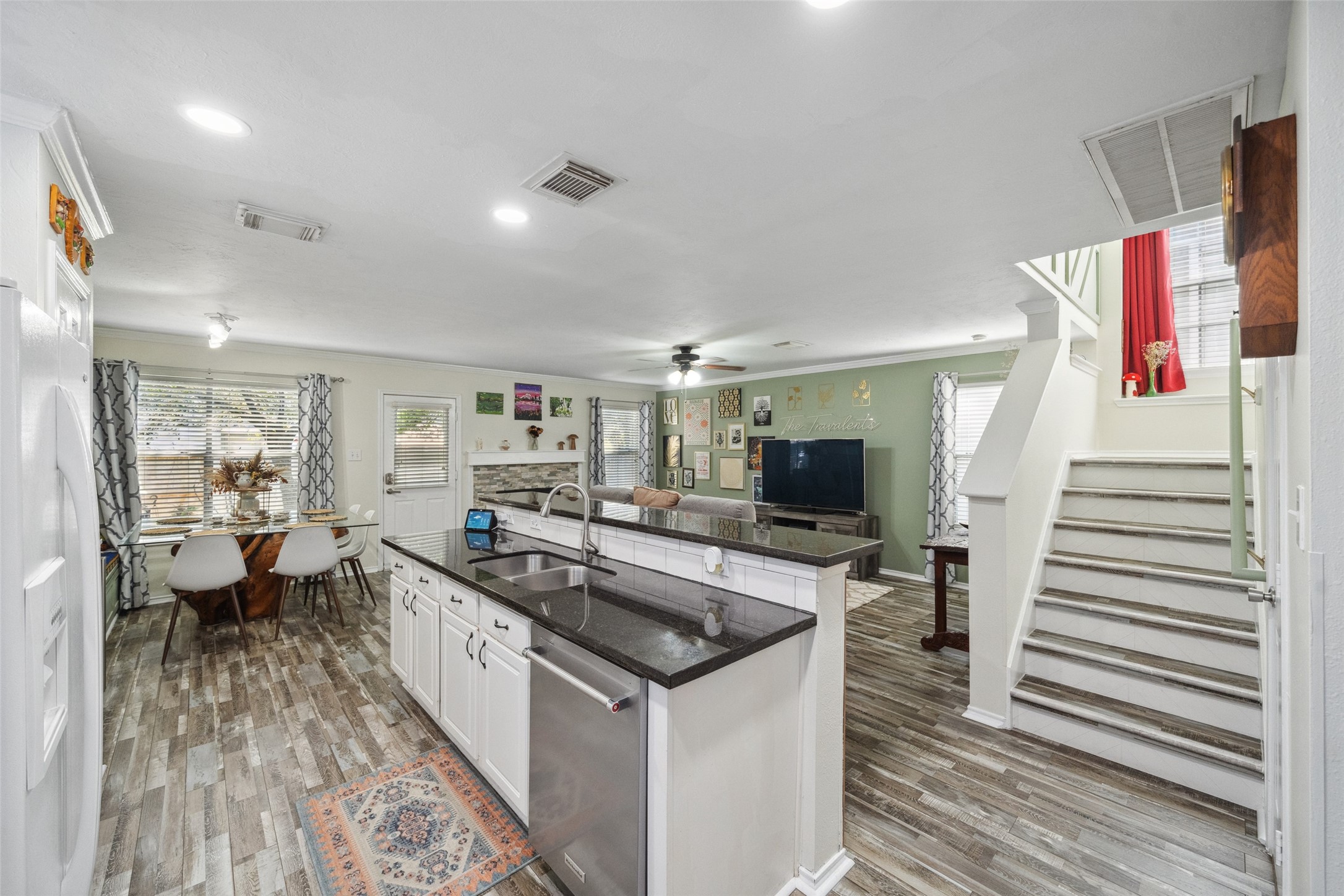38 Wineberry Place Spring, TX 77382 - Photo 8 of 32 a kitchen with a sink and a stove top oven