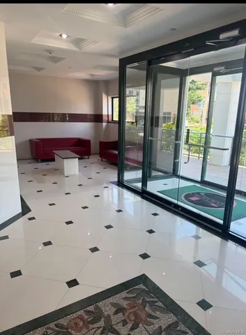 a bathroom with a sink and a large mirror