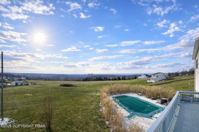 a view of an ocean and city