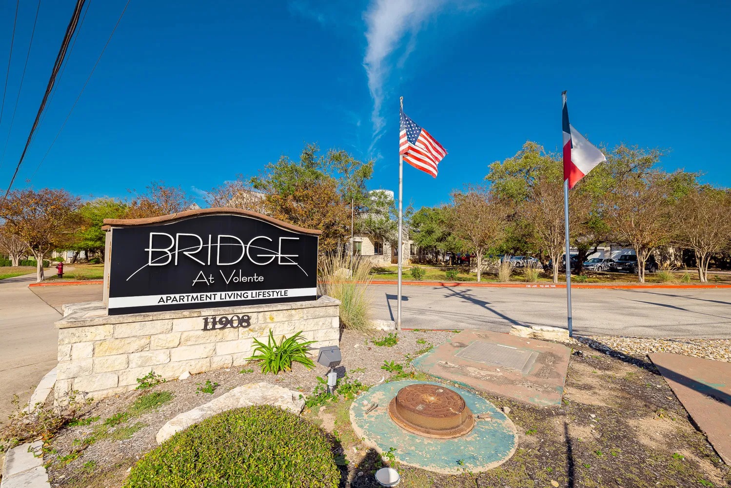 11908 Anderson Mill Road, Unit 317 Cedar Park, TX 78613 - Photo 1 of 1 a view of street with yellow house