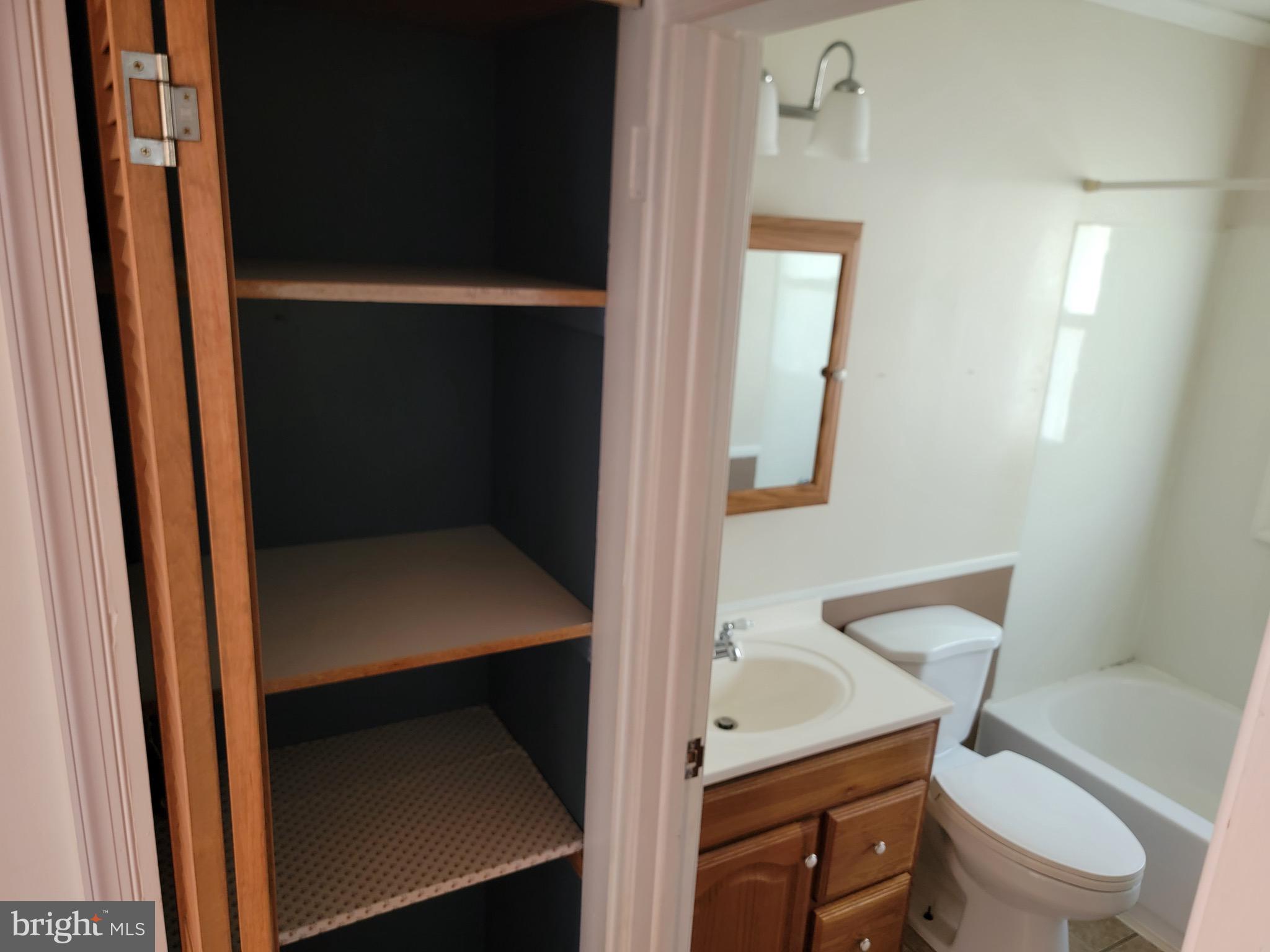 10816 Livingston Road Fort Washington, MD 20744 - Photo 11 of 26 a bathroom with a toilet