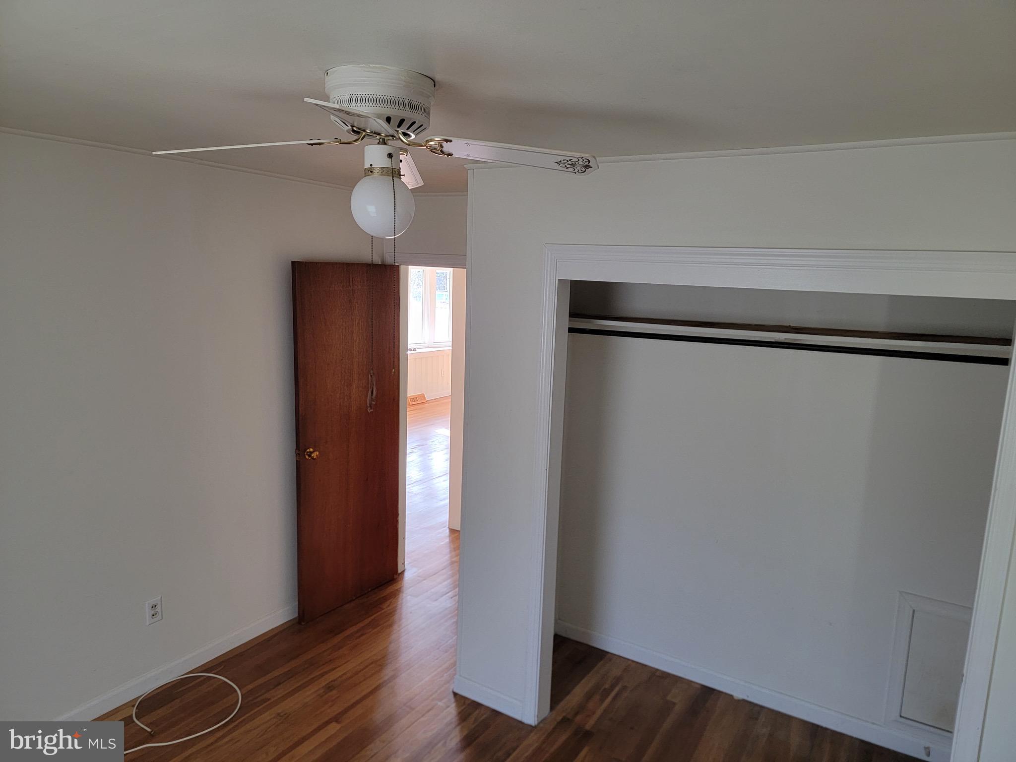 10816 Livingston Road Fort Washington, MD 20744 - Photo 14 of 26 a view of a livingroom with wooden floor