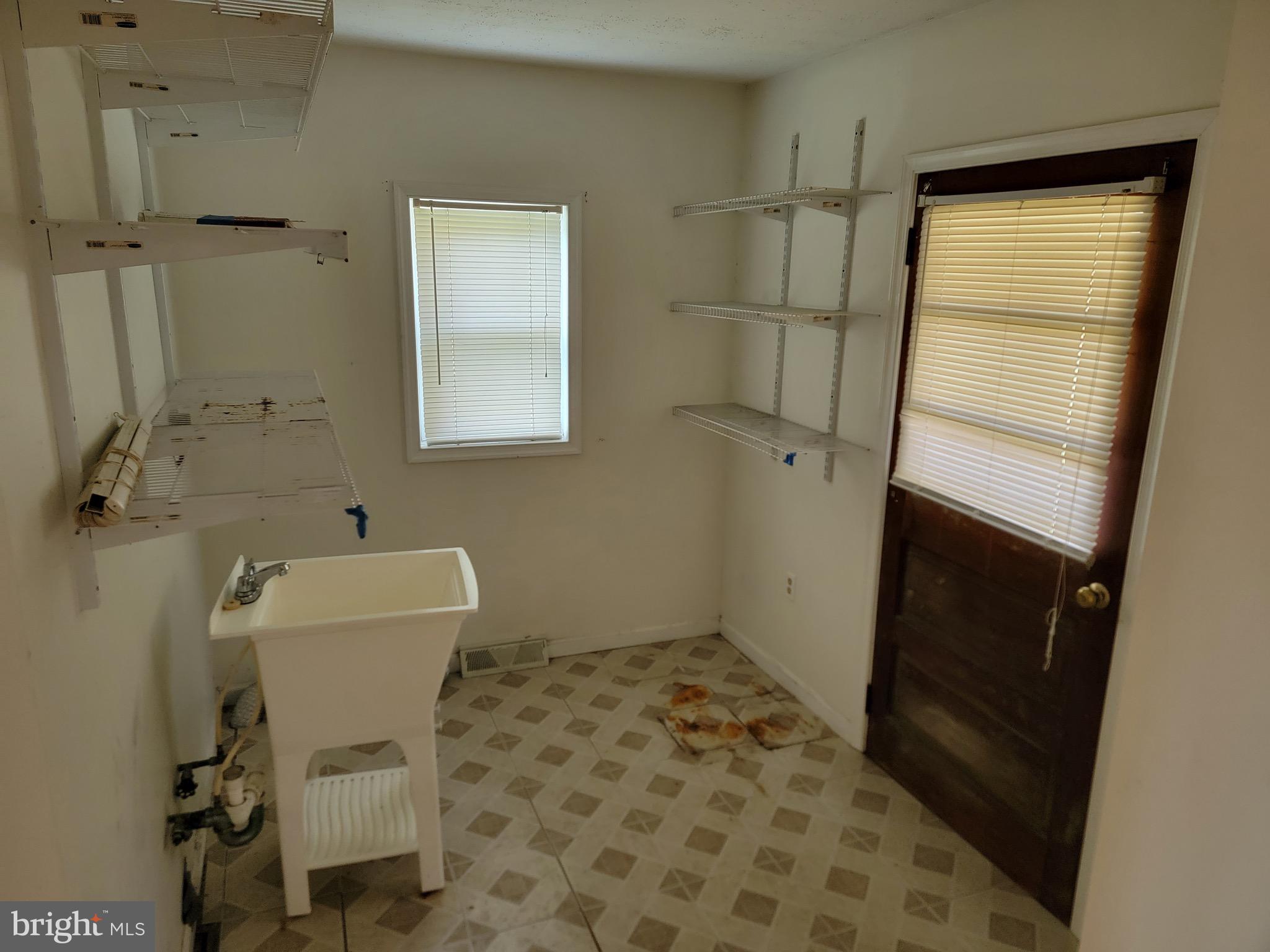10816 Livingston Road Fort Washington, MD 20744 - Photo 24 of 26 a bathroom with a sink toilet and shower