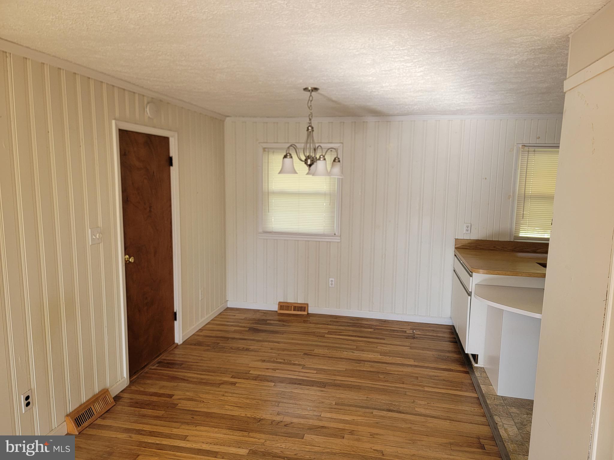 10816 Livingston Road Fort Washington, MD 20744 - Photo 4 of 26 a room that has a bed and a window in it
