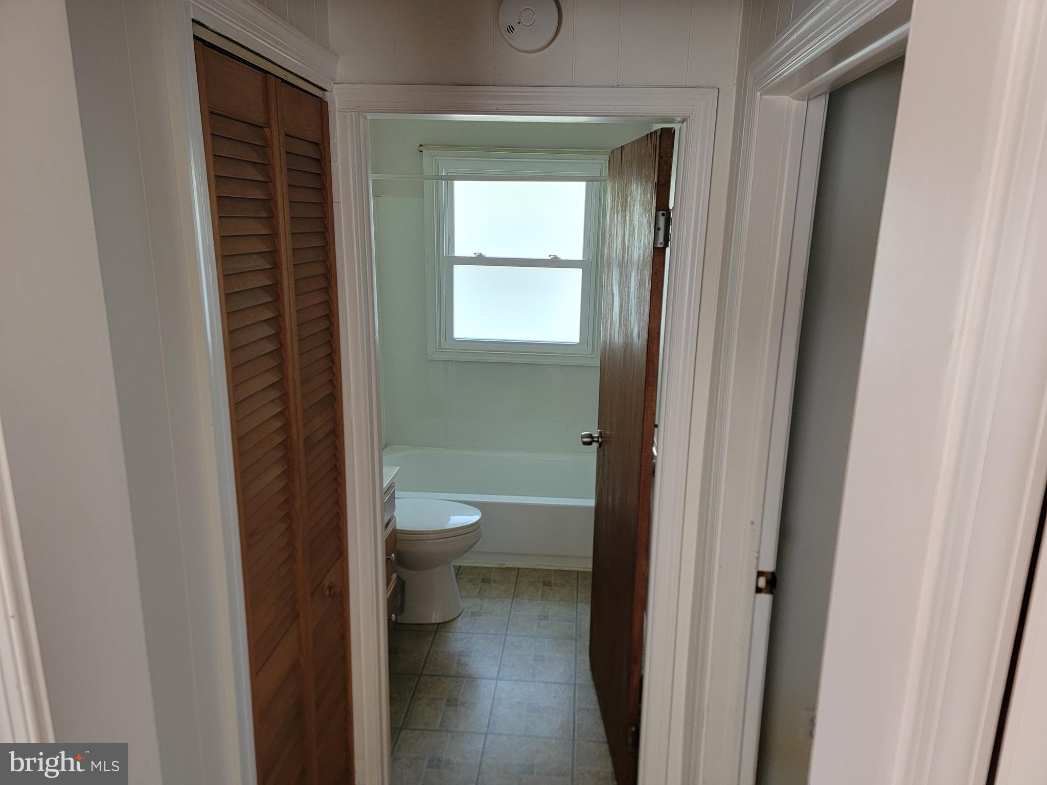 10816 Livingston Road Fort Washington, MD 20744 - Photo 5 of 26 a bathroom with a toilet