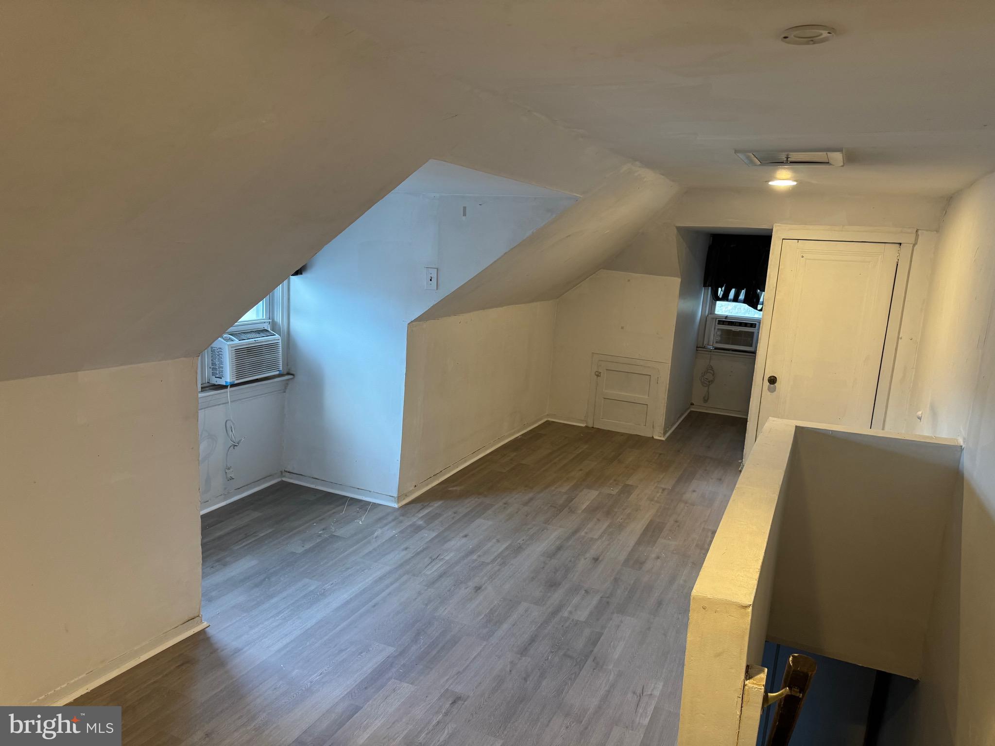 410 Laurel Road Lansdowne, PA 19050 - Photo 6 of 19 a view of a kitchen with wooden floor and electronic appliances
