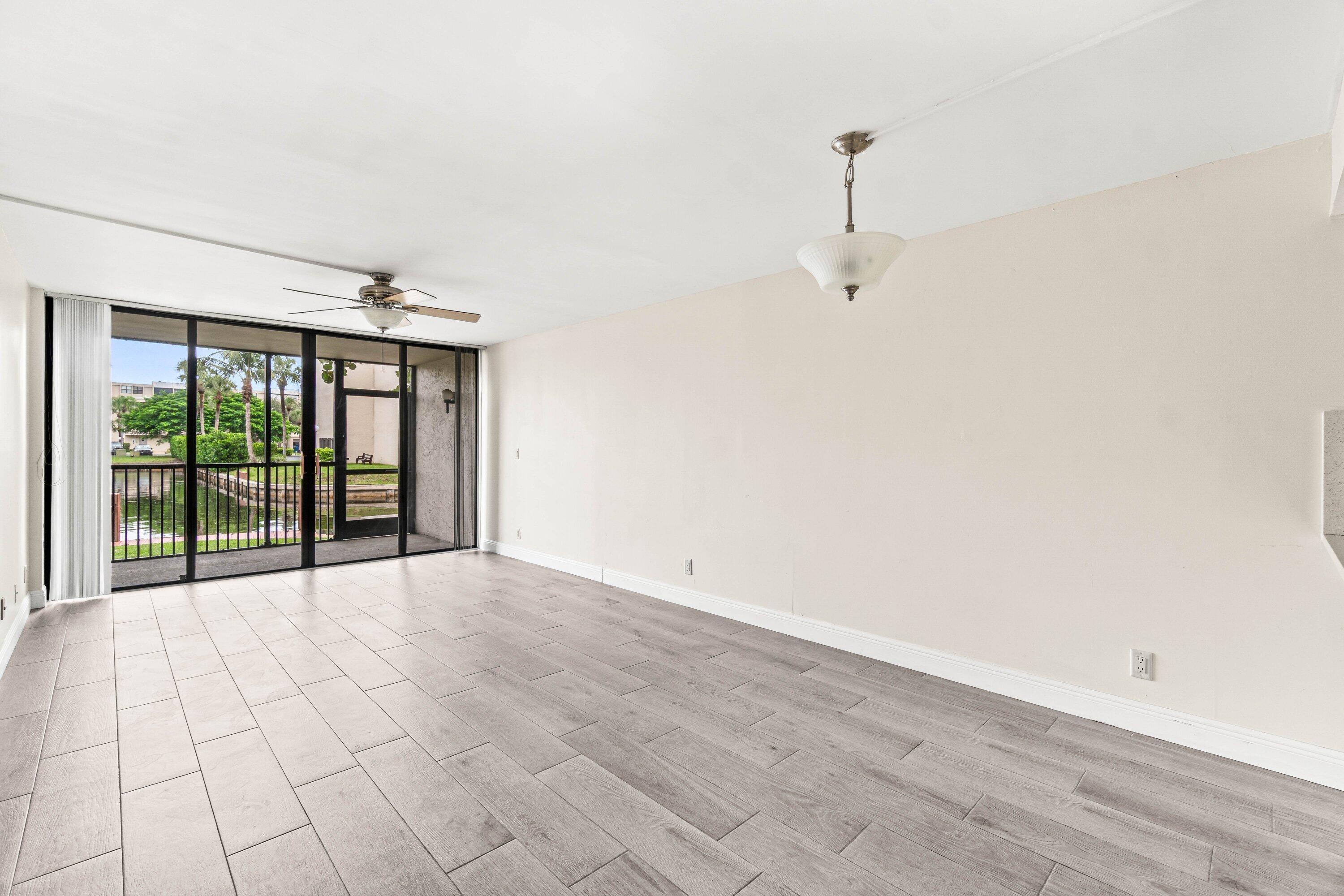 17 Royal Palm Way, Unit 103 Boca Raton, FL 33432 - Photo 8 of 30 a view of an empty room with a window