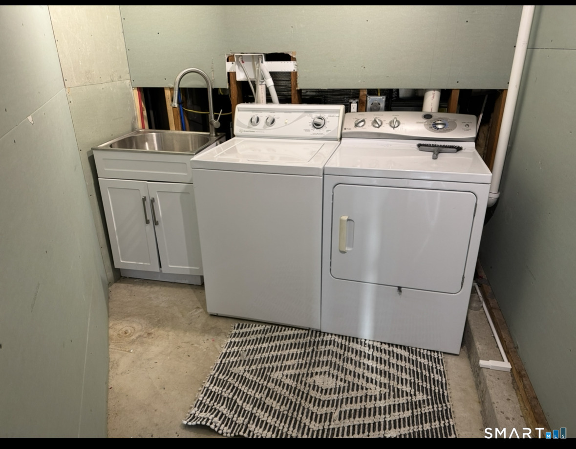 35 Knapps Highway Fairfield, CT 06825 - Photo 21 of 21 a utility room with dryer and washer