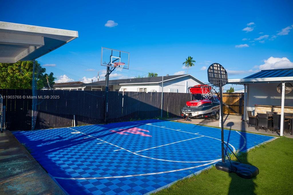 1960 Southwest 128th Court Miami, FL 33175 - Photo 31 of 32 a view of a chairs and tables in the patio