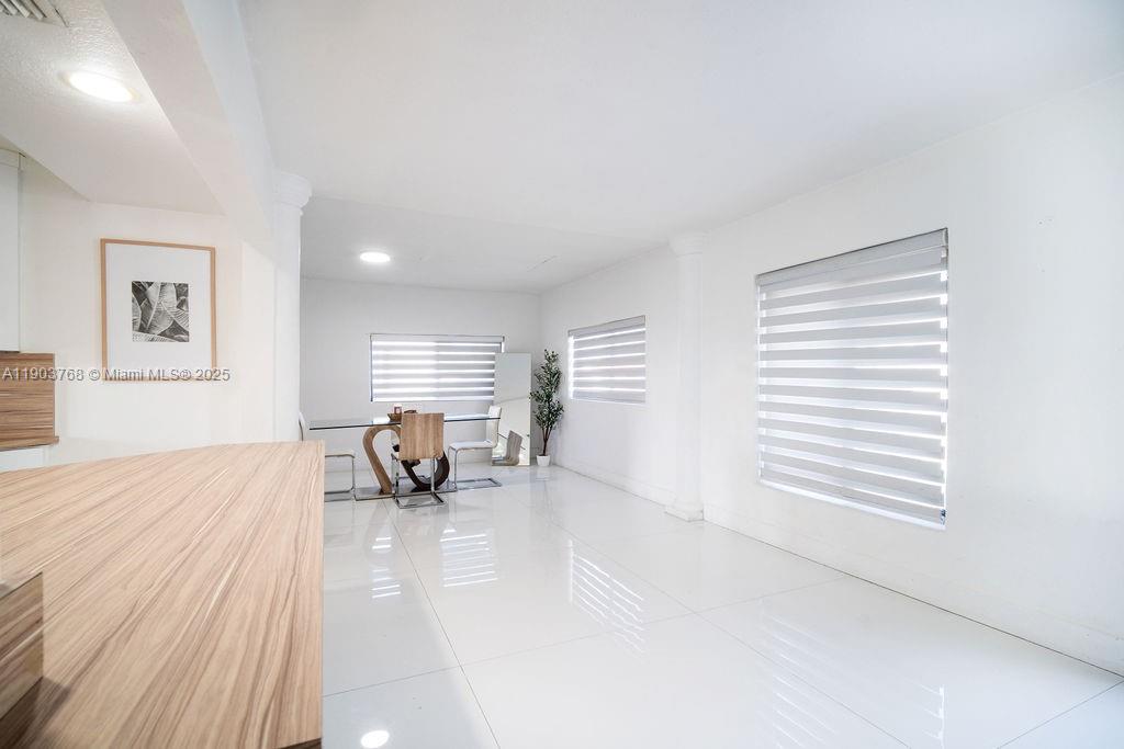 1960 Southwest 128th Court Miami, FL 33175 - Photo 8 of 32 a living room with furniture and a window