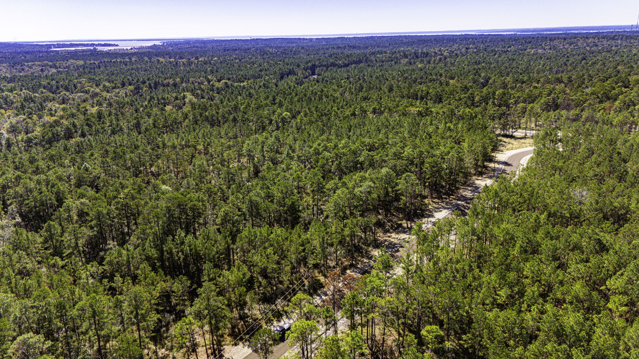33 King Ranch Road Road Onalaska, TX 77360 - Photo 7 of 16 a view of a large yard with an outdoor space