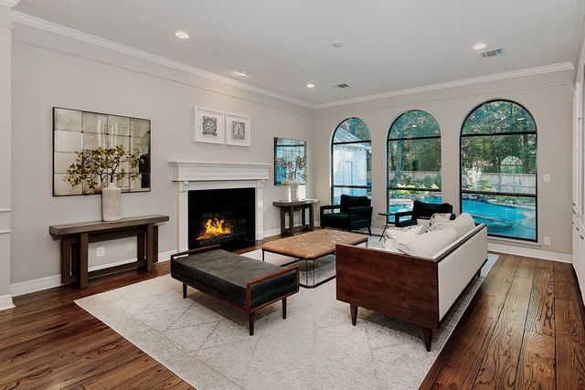 a workspace with furniture window and wooden floor