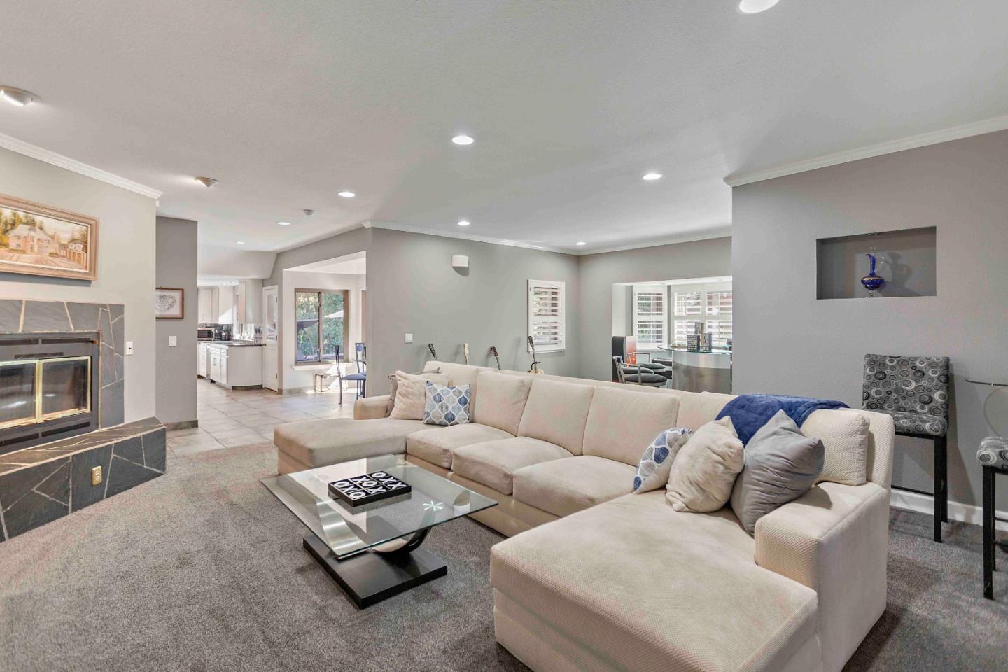 23491 Summit Road Los Gatos, CA 95033 - Photo 24 of 77 a living room with furniture white walls and a fireplace