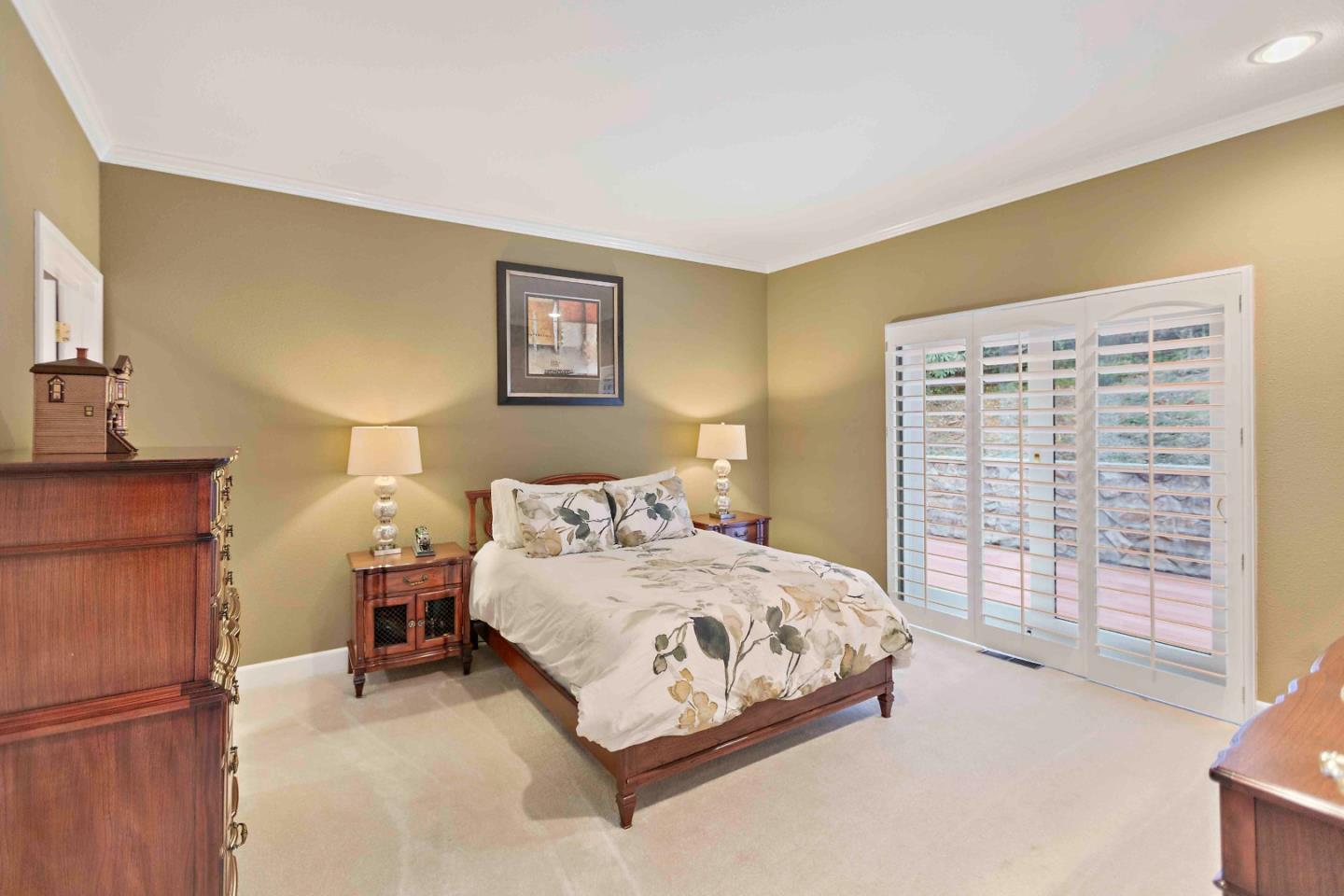 23491 Summit Road Los Gatos, CA 95033 - Photo 30 of 77 a bedroom with a bed and a refrigerator