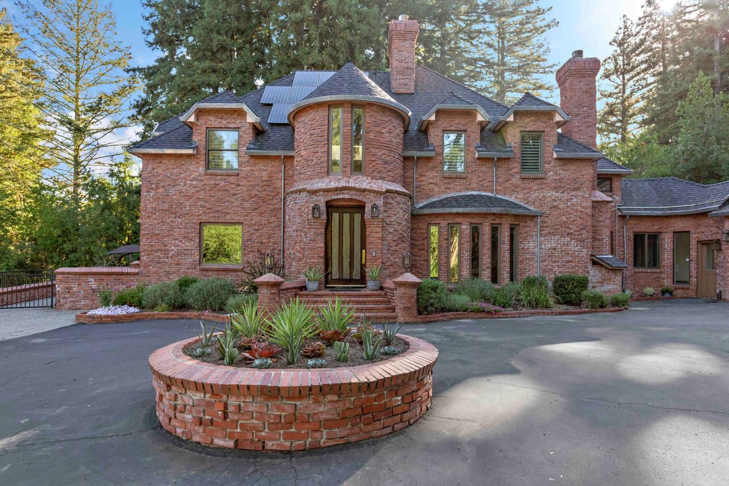 23491 Summit Road Los Gatos, CA 95033 - Photo 3 of 77 a front view of a house with a yard