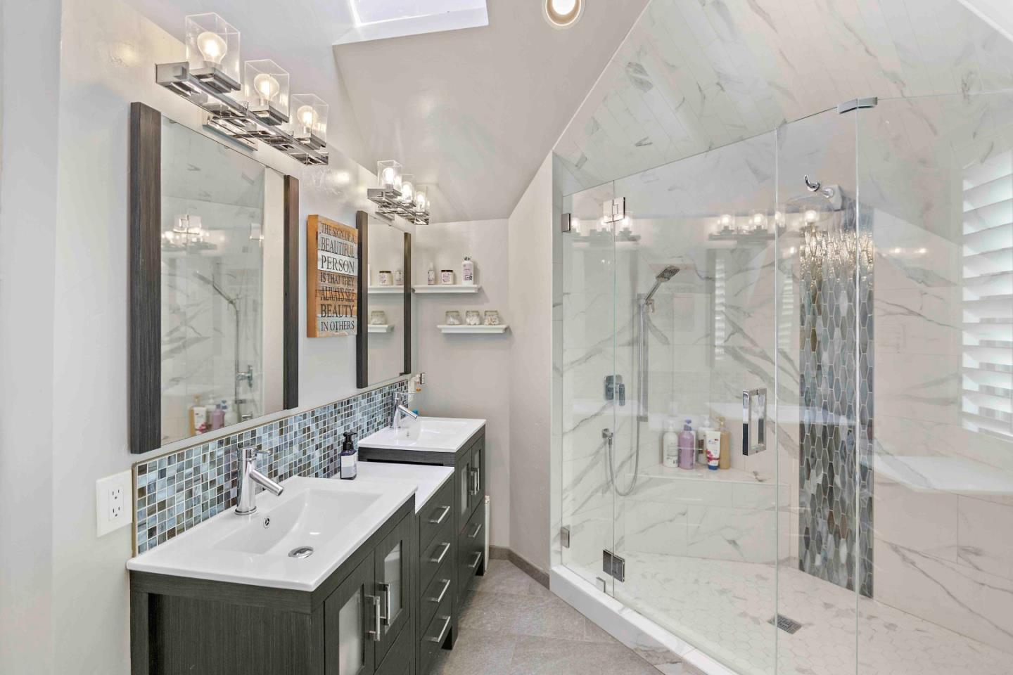 23491 Summit Road Los Gatos, CA 95033 - Photo 37 of 77 a bathroom with a bathtub shower sink and mirror