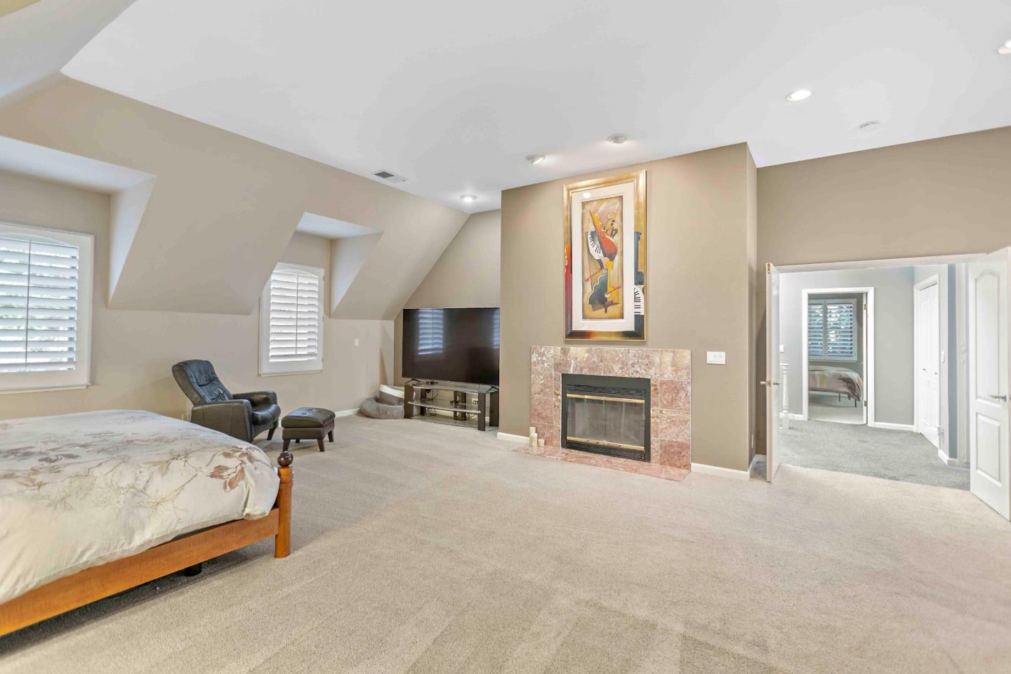 23491 Summit Road Los Gatos, CA 95033 - Photo 41 of 77 a bedroom with bed and a flat screen tv