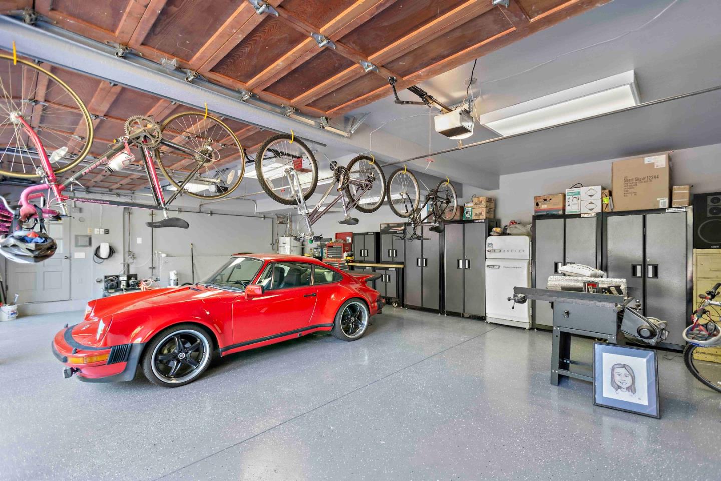 23491 Summit Road Los Gatos, CA 95033 - Photo 60 of 77 a car is parked in a garage