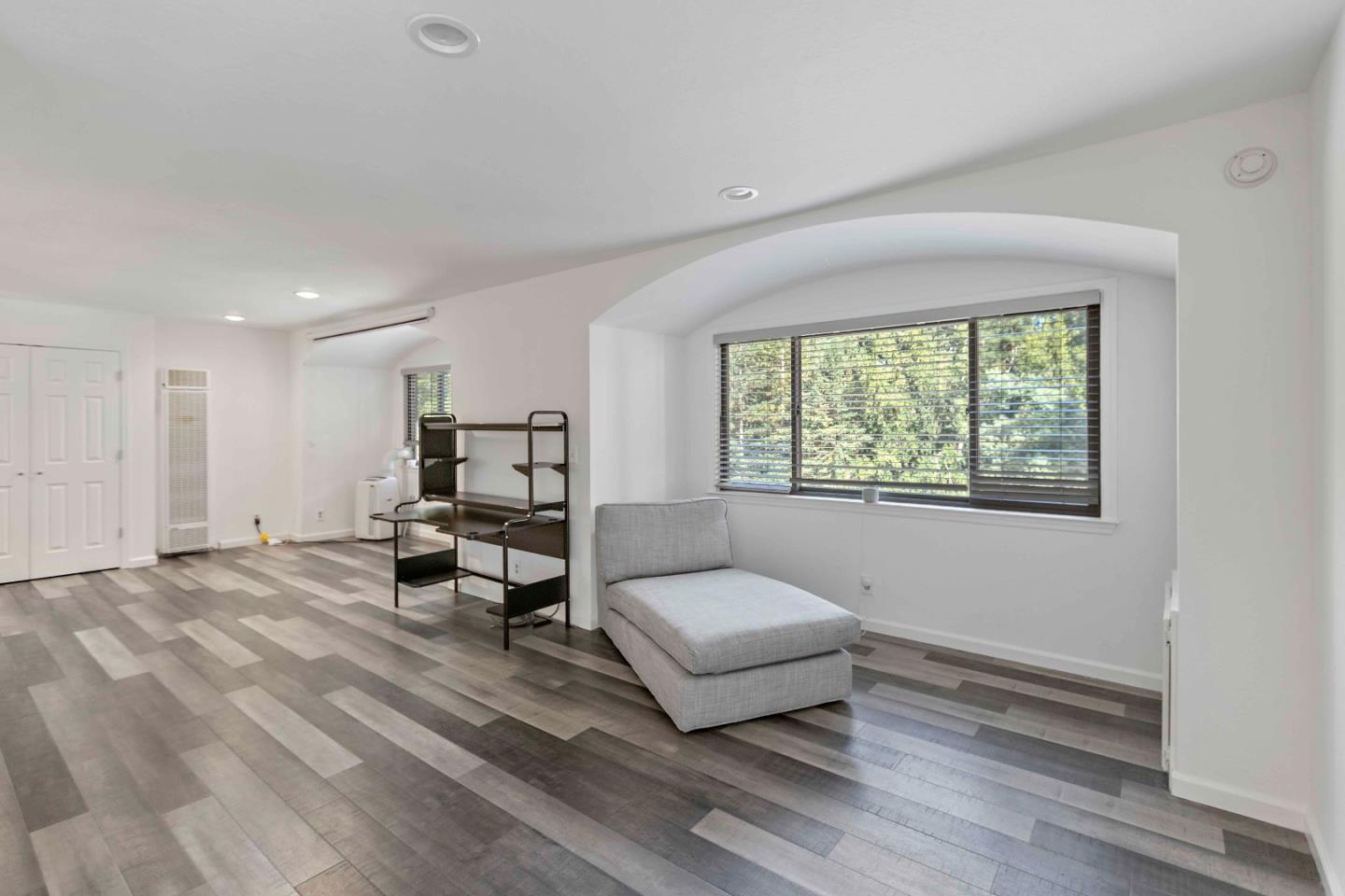 23491 Summit Road Los Gatos, CA 95033 - Photo 62 of 77 a living room with furniture and a window