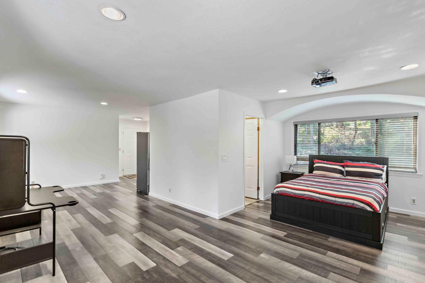 23491 Summit Road Los Gatos, CA 95033 - Photo 65 of 77 a bedroom with a bed and a window