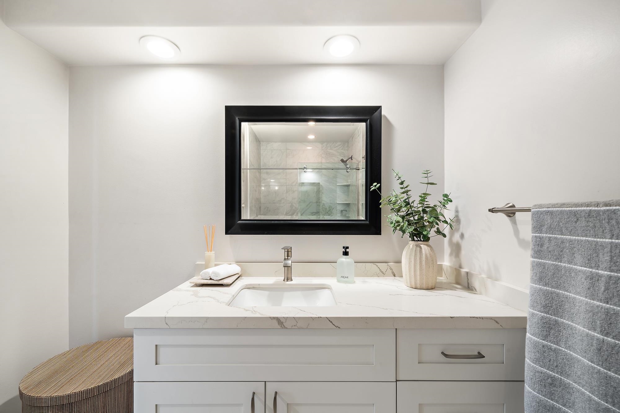 84 Mano Drive Kula, HI 96790 - Photo 20 of 25 a bathroom with a sink and a mirror