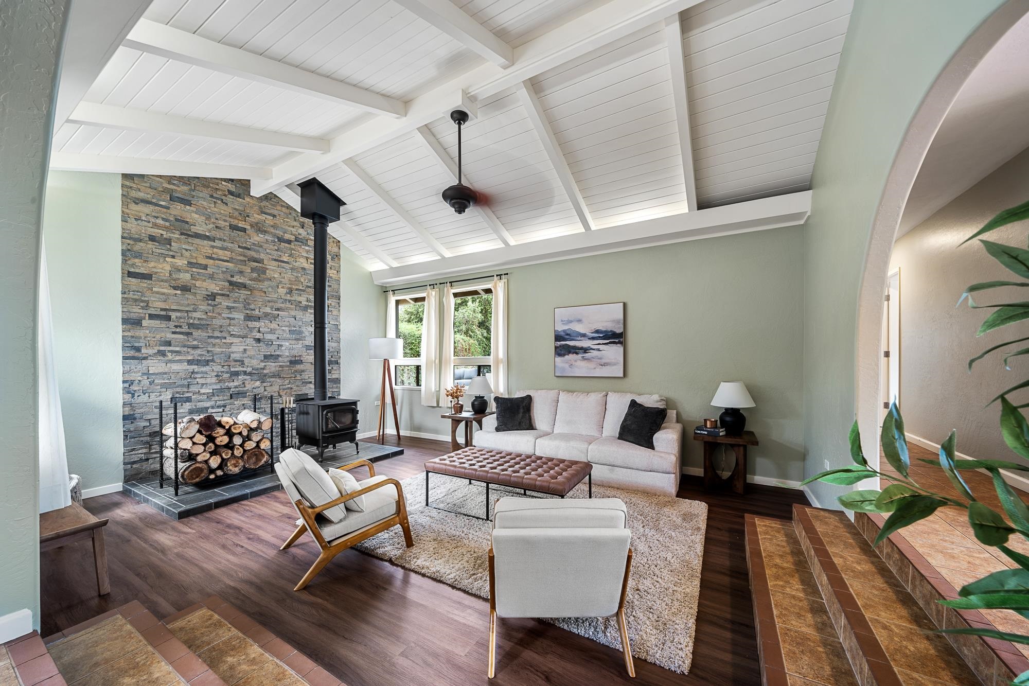 84 Mano Drive Kula, HI 96790 - Photo 4 of 25 a living room with furniture and a fireplace