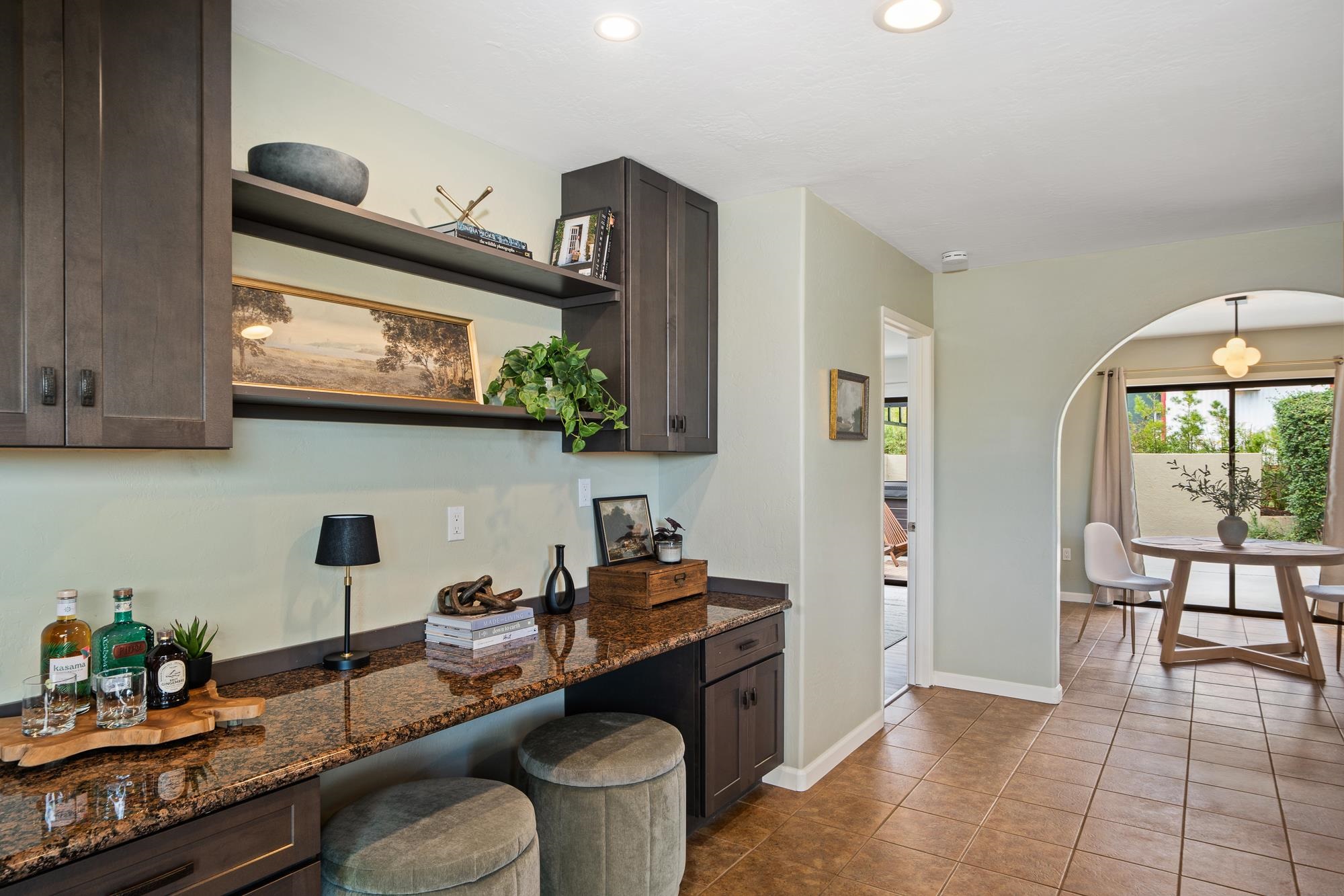 84 Mano Drive Kula, HI 96790 - Photo 6 of 25 a kitchen with stainless steel appliances granite countertop a stove and cabinets